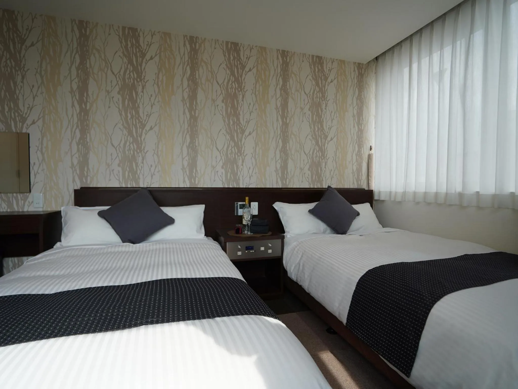 Photo of the whole room, Bed in Hotel New Gaea Domemae