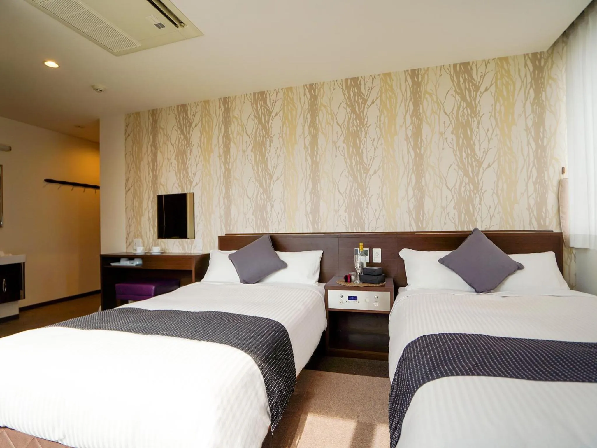 Photo of the whole room, Bed in Hotel New Gaea Domemae