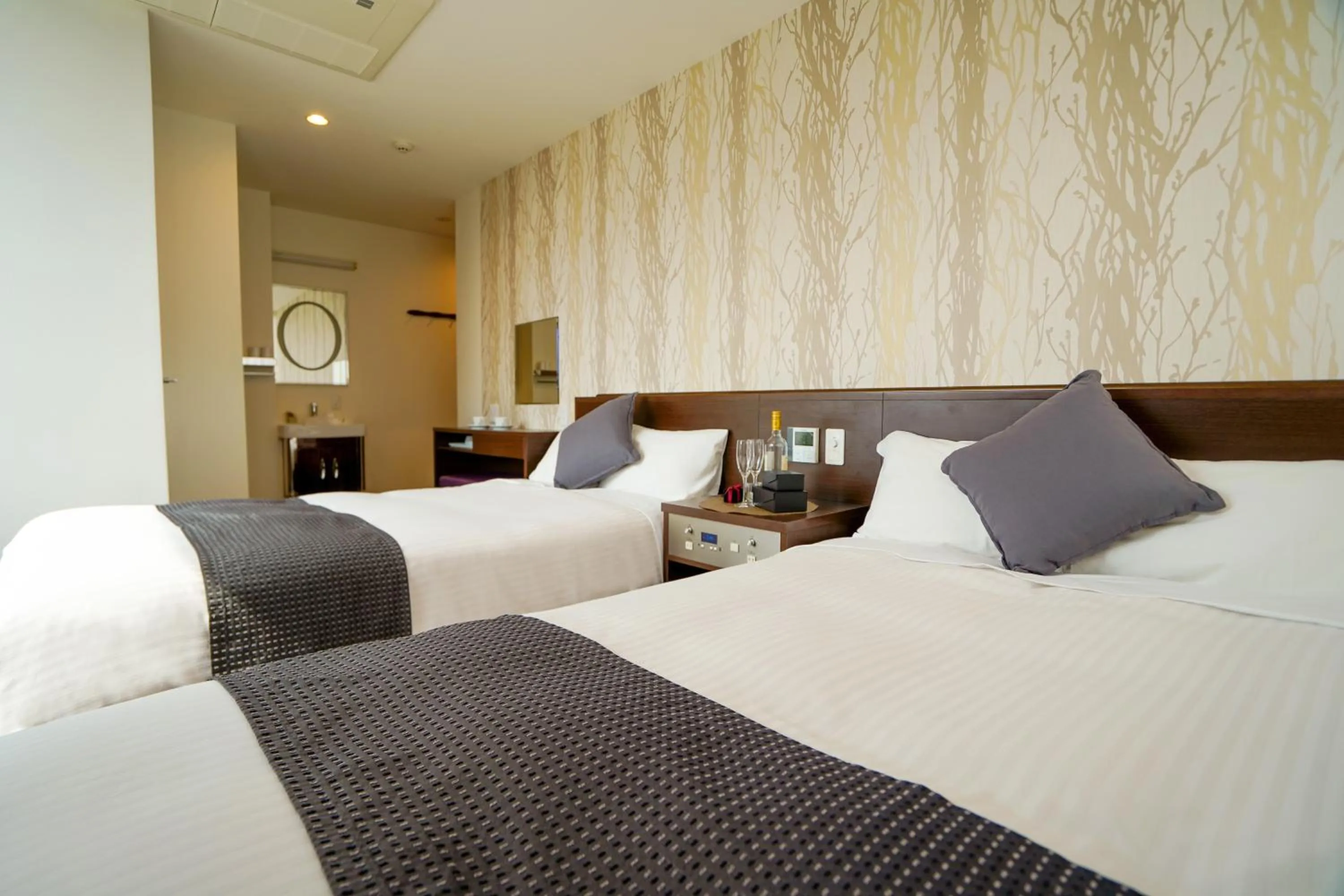 Photo of the whole room, Bed in Hotel New Gaea Domemae