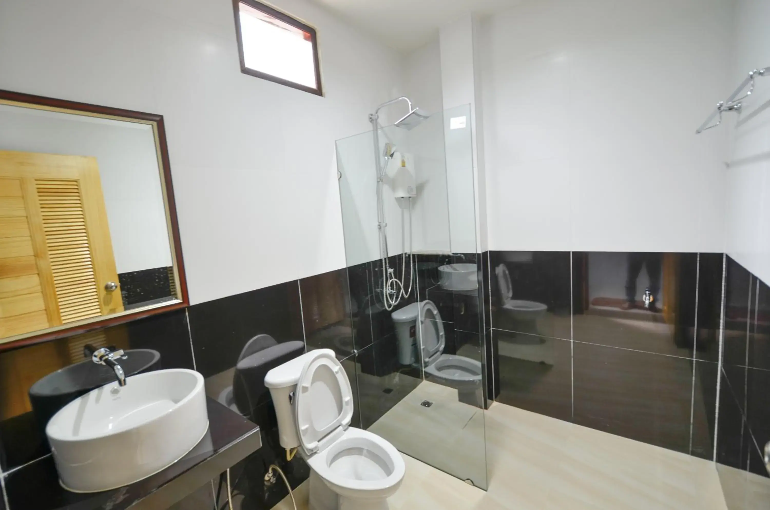 Bathroom in tum mai kaew resort (SHA Extra Plus)