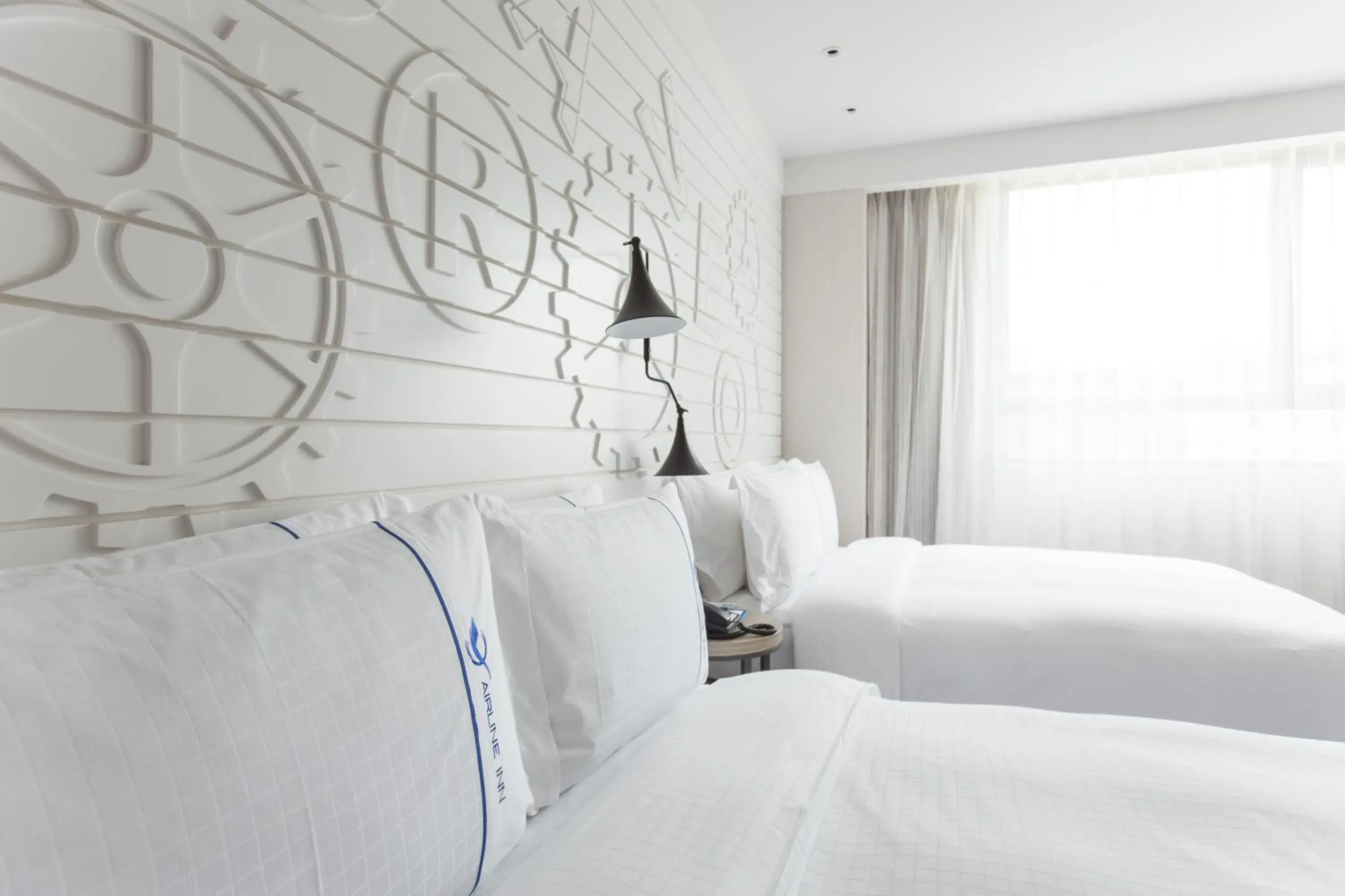 Seating area, Bed in Airline Inn - Kaohsiung Station Seating area, Bed in Airline Inn - Kaohsiung Station