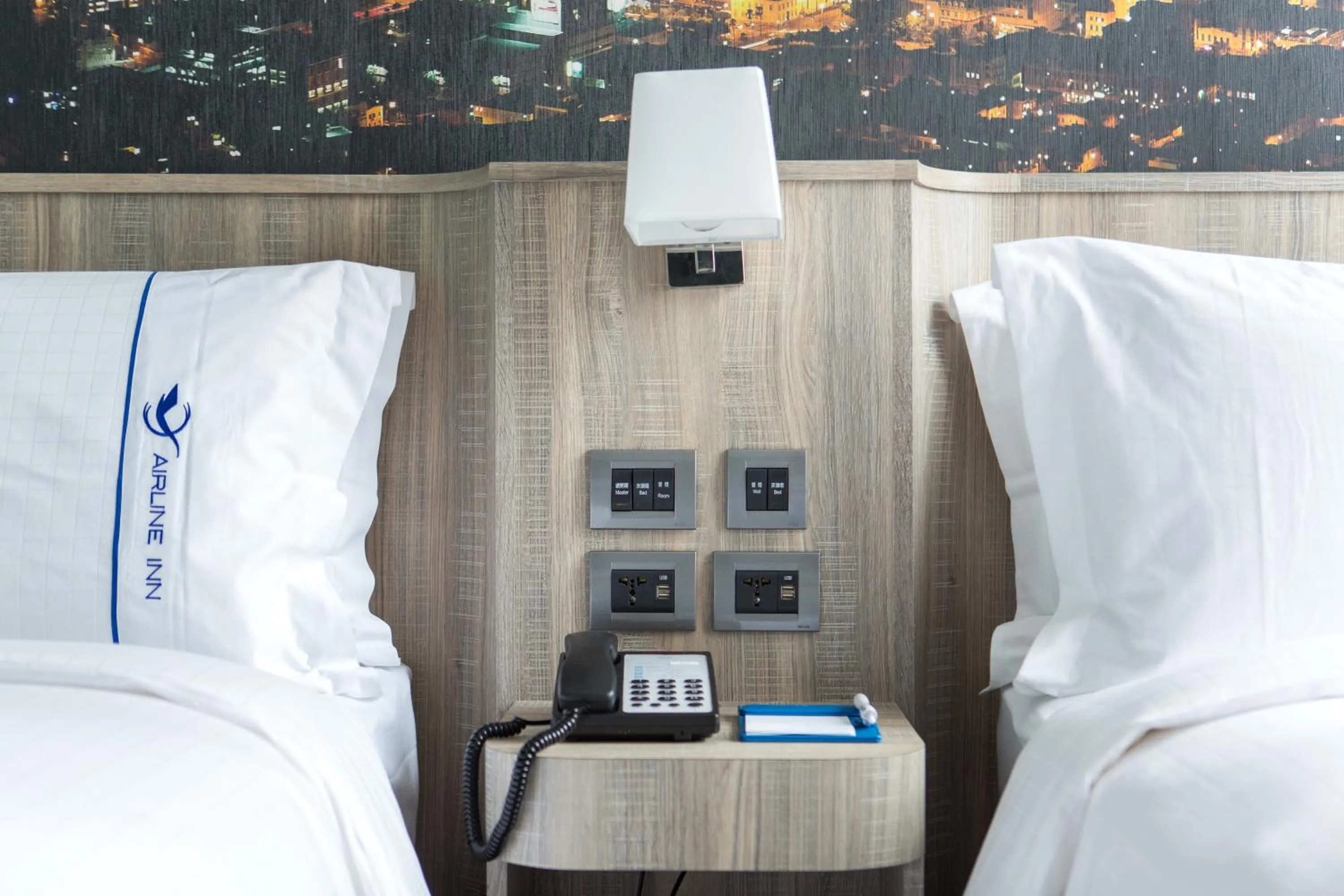 Photo of the whole room, Bed in Airline Inn - Kaohsiung Station