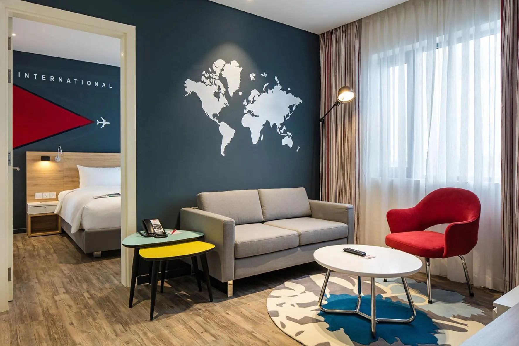 Seating area, Bed in Ibis Saigon Airport