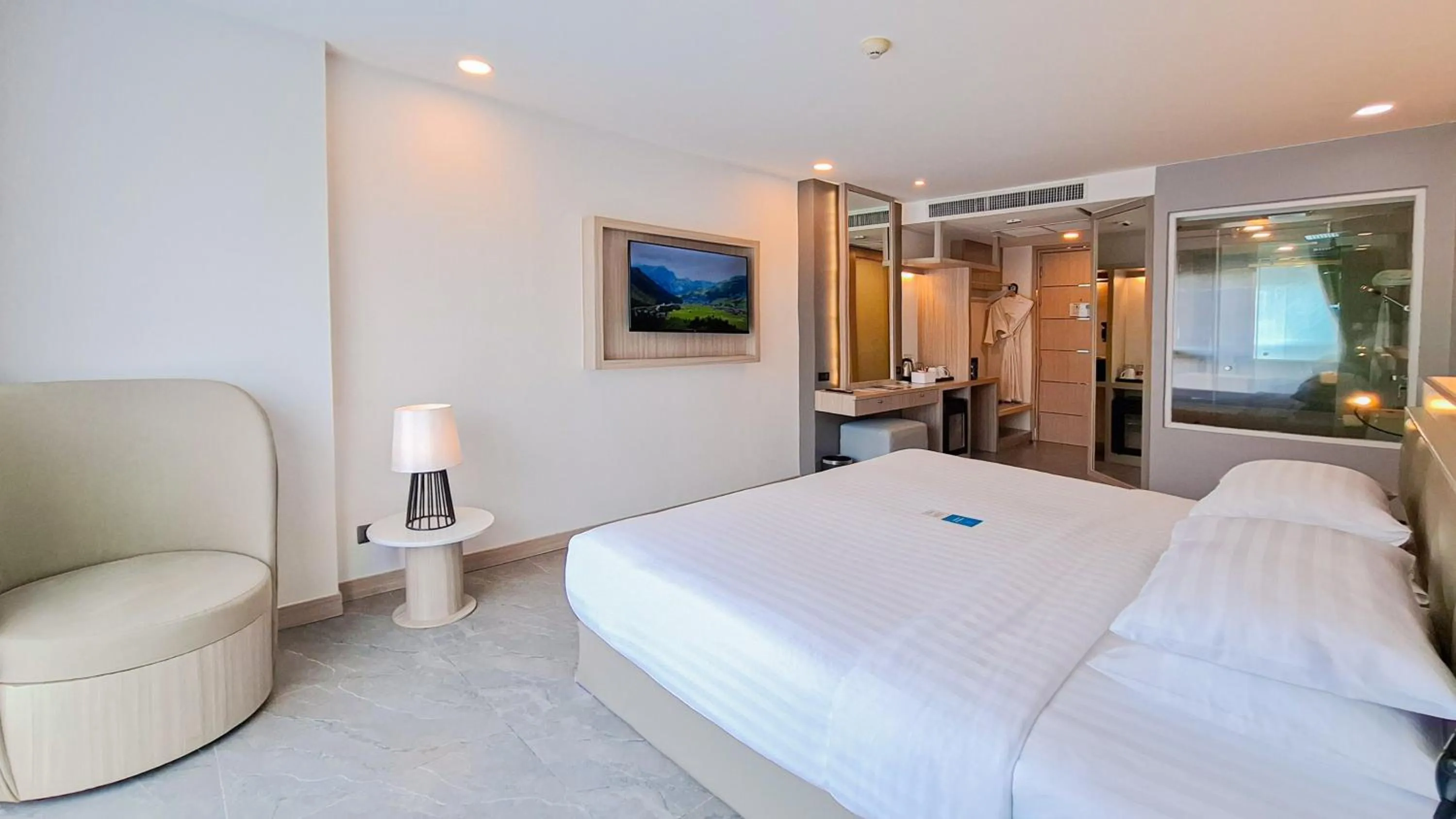 Bed in Clarian Hotel Beach Patong