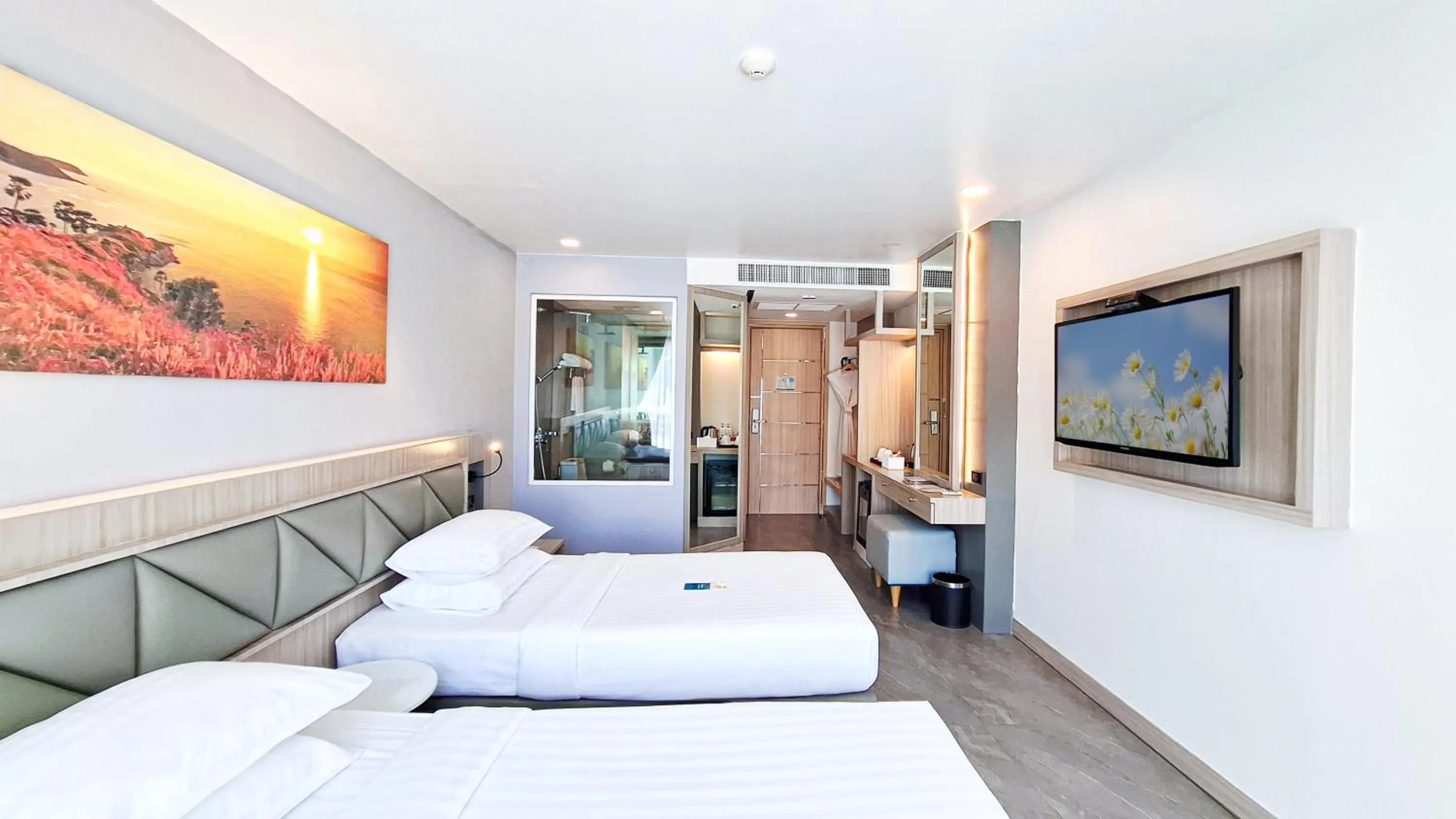 Bed in Clarian Hotel Beach Patong