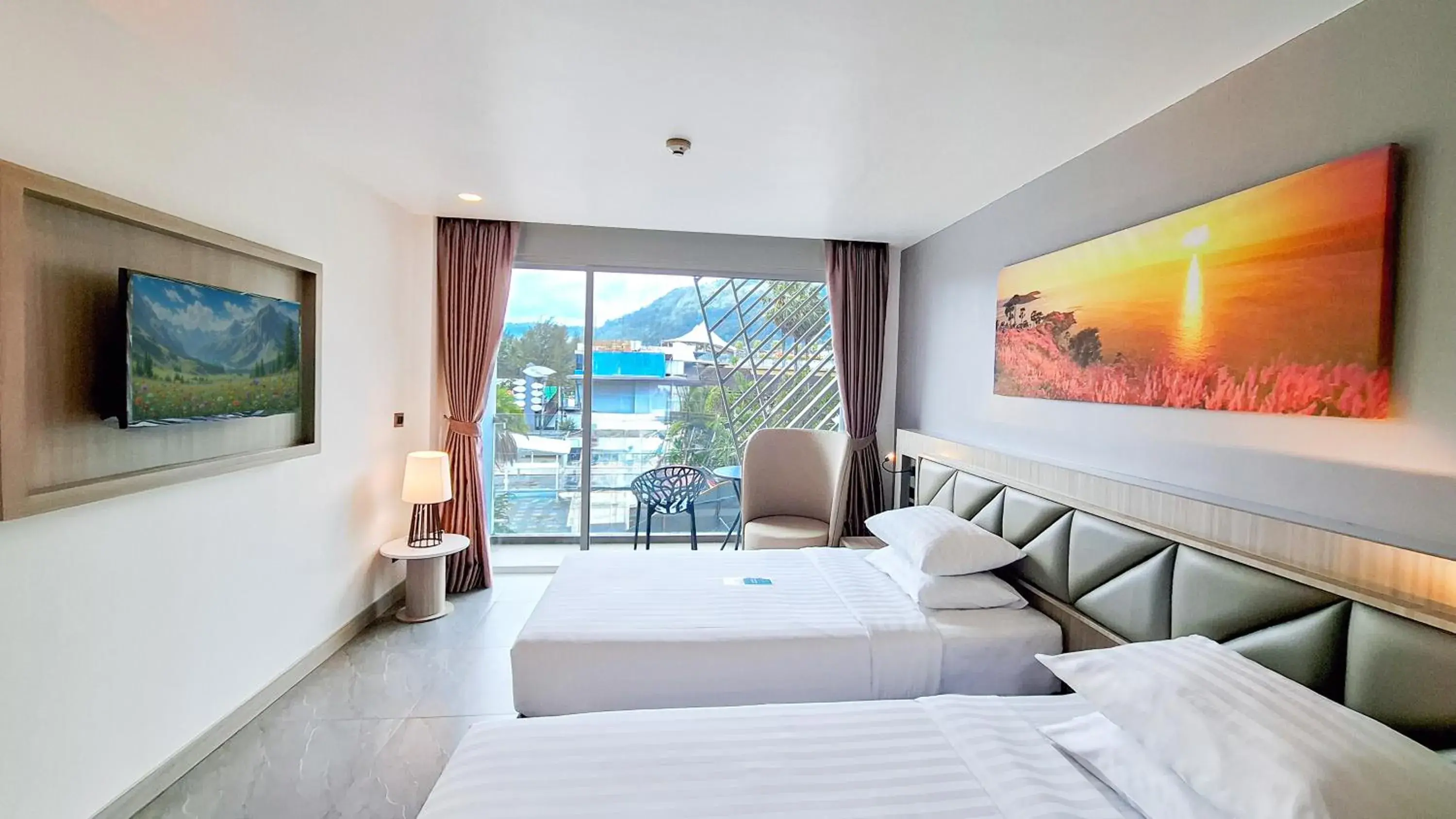 Deluxe Twin Room with Balcony and Mountain View in Clarian Hotel Beach Patong Deluxe Twin Room with Balcony and Mountain View in Clarian Hotel Beach Patong