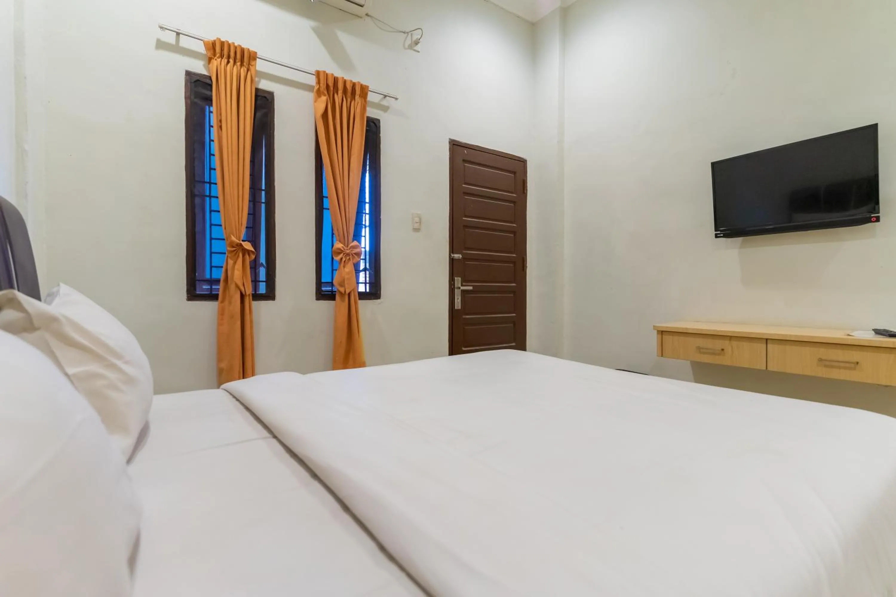 Bed in Vandolia Guest House Medan RedPartner