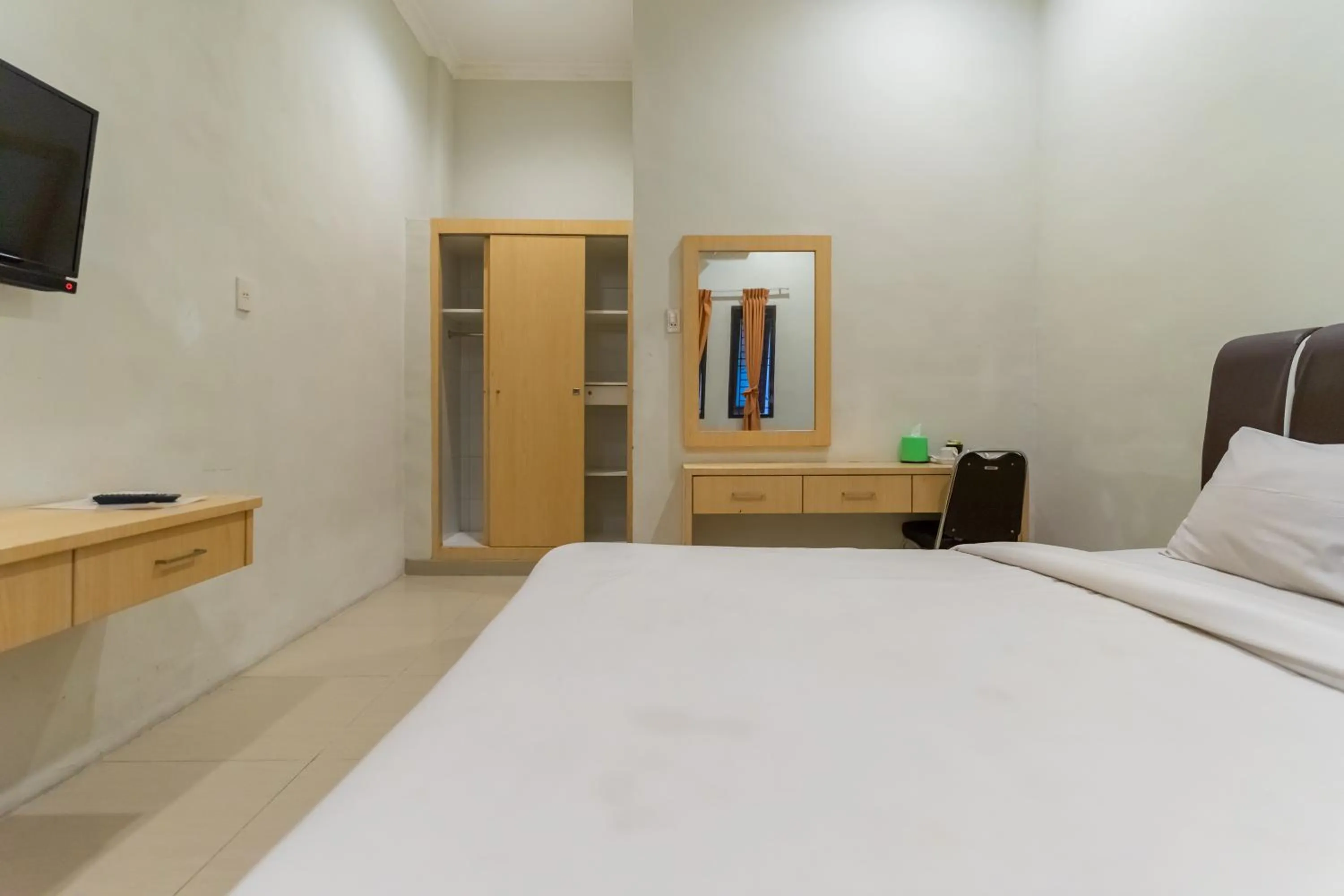 Bed in Vandolia Guest House Medan RedPartner
