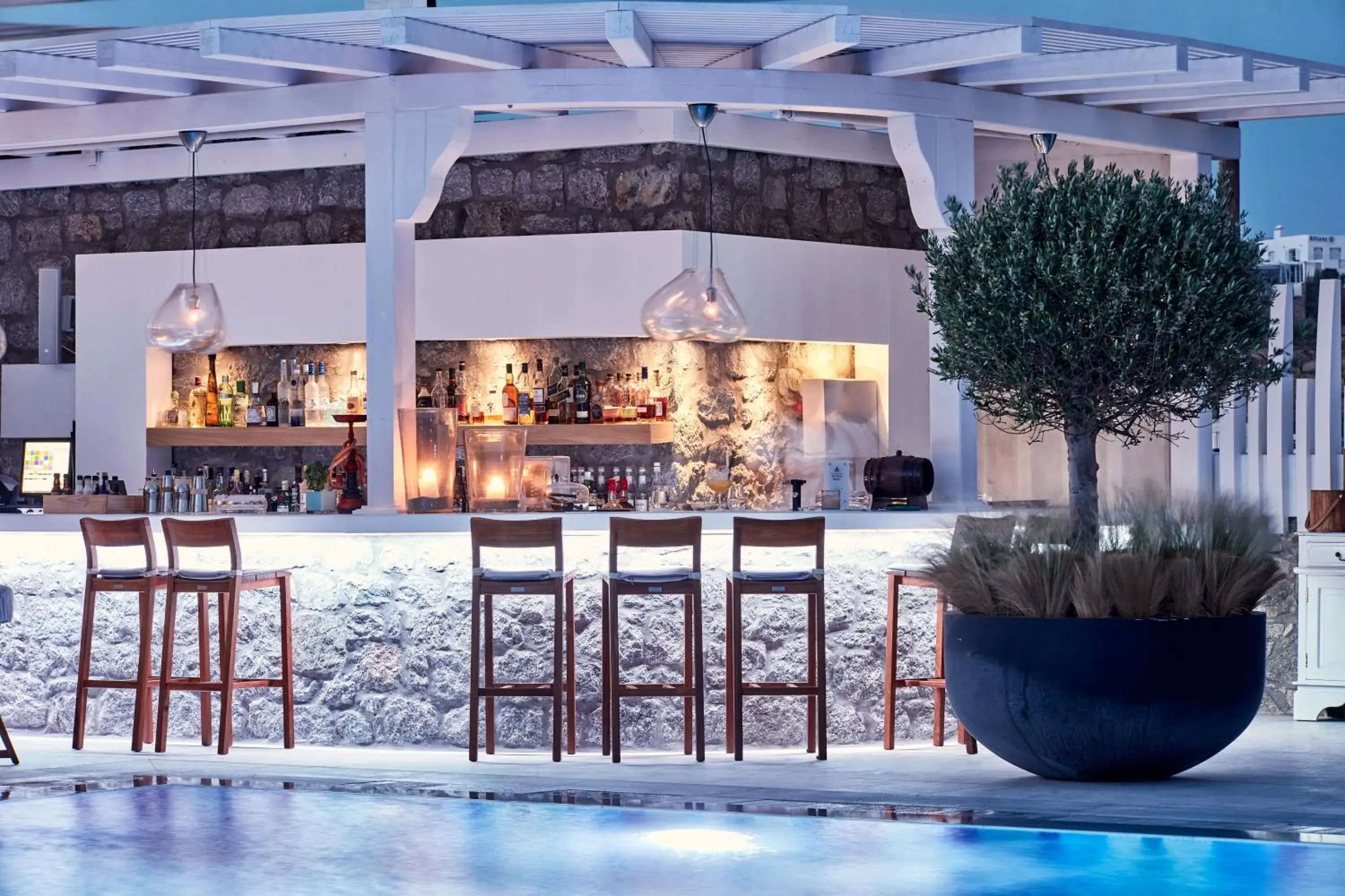 Lounge or bar in Myconian Kyma, a Member of Design Hotels Lounge or bar in Myconian Kyma, a Member of Design Hotels