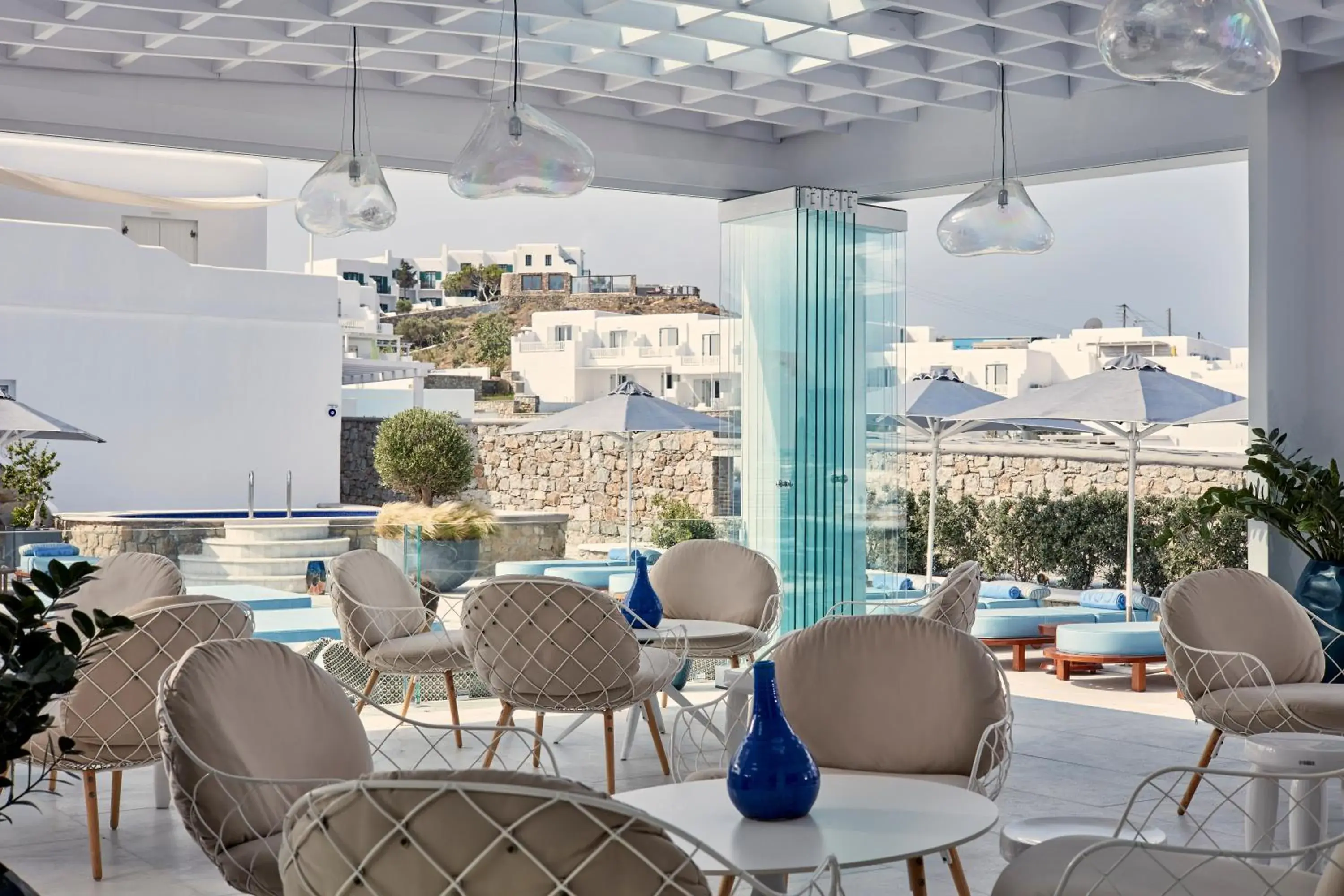 Lounge or bar in Myconian Kyma, a Member of Design Hotels Lounge or bar in Myconian Kyma, a Member of Design Hotels