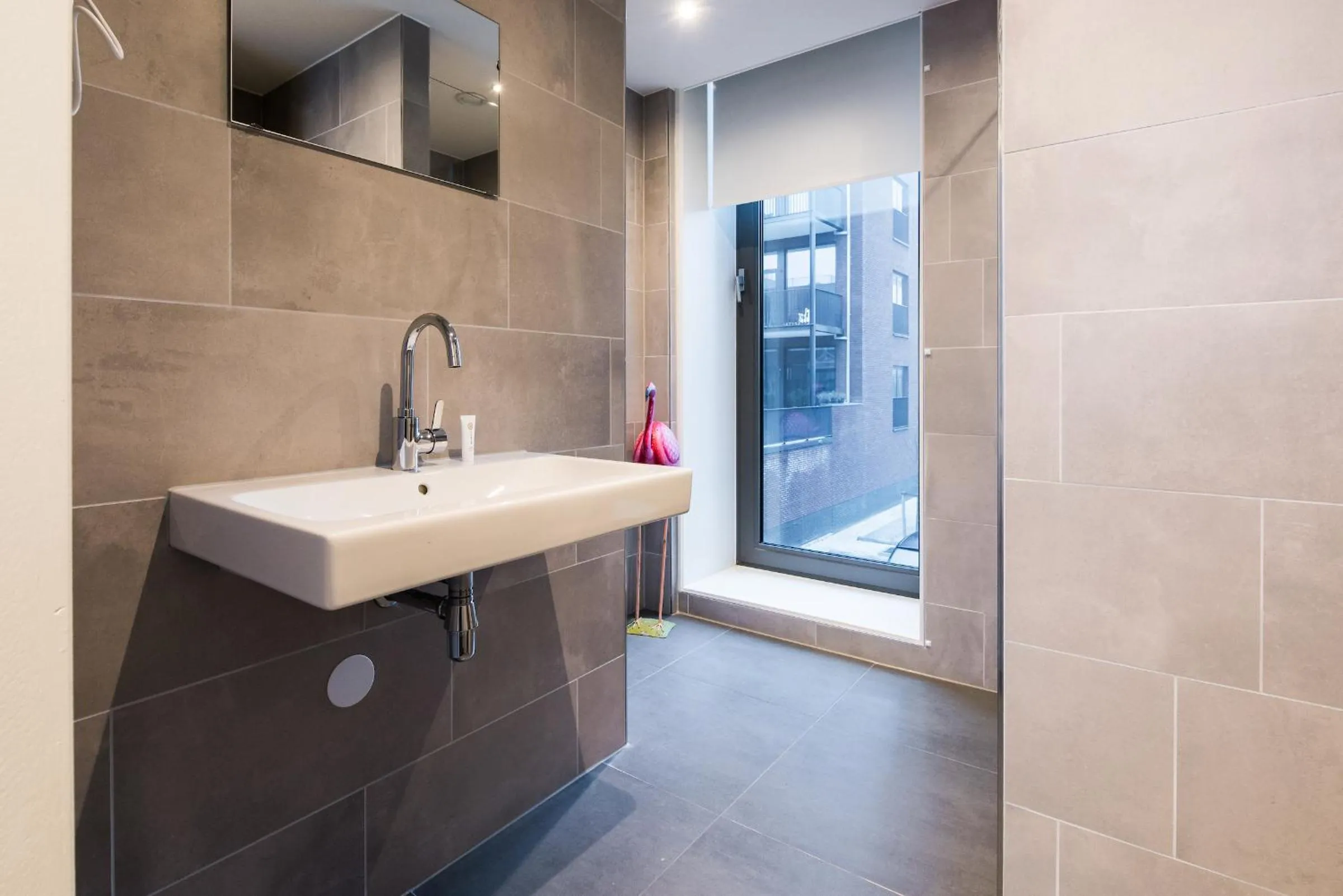 Bathroom in YAYS Amsterdam North by Numa