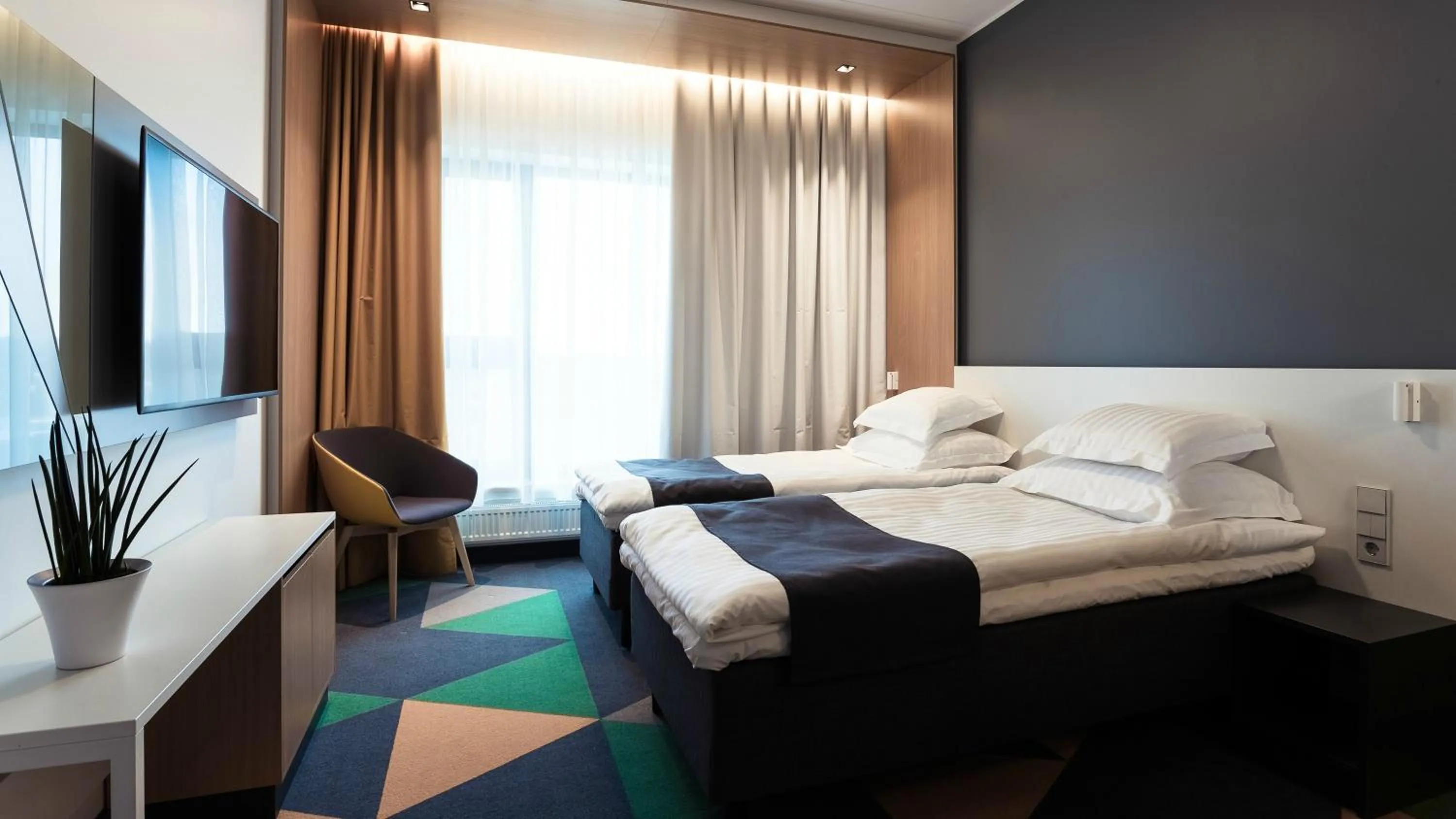 Bed in Hotel Sophia by Tartuhotels