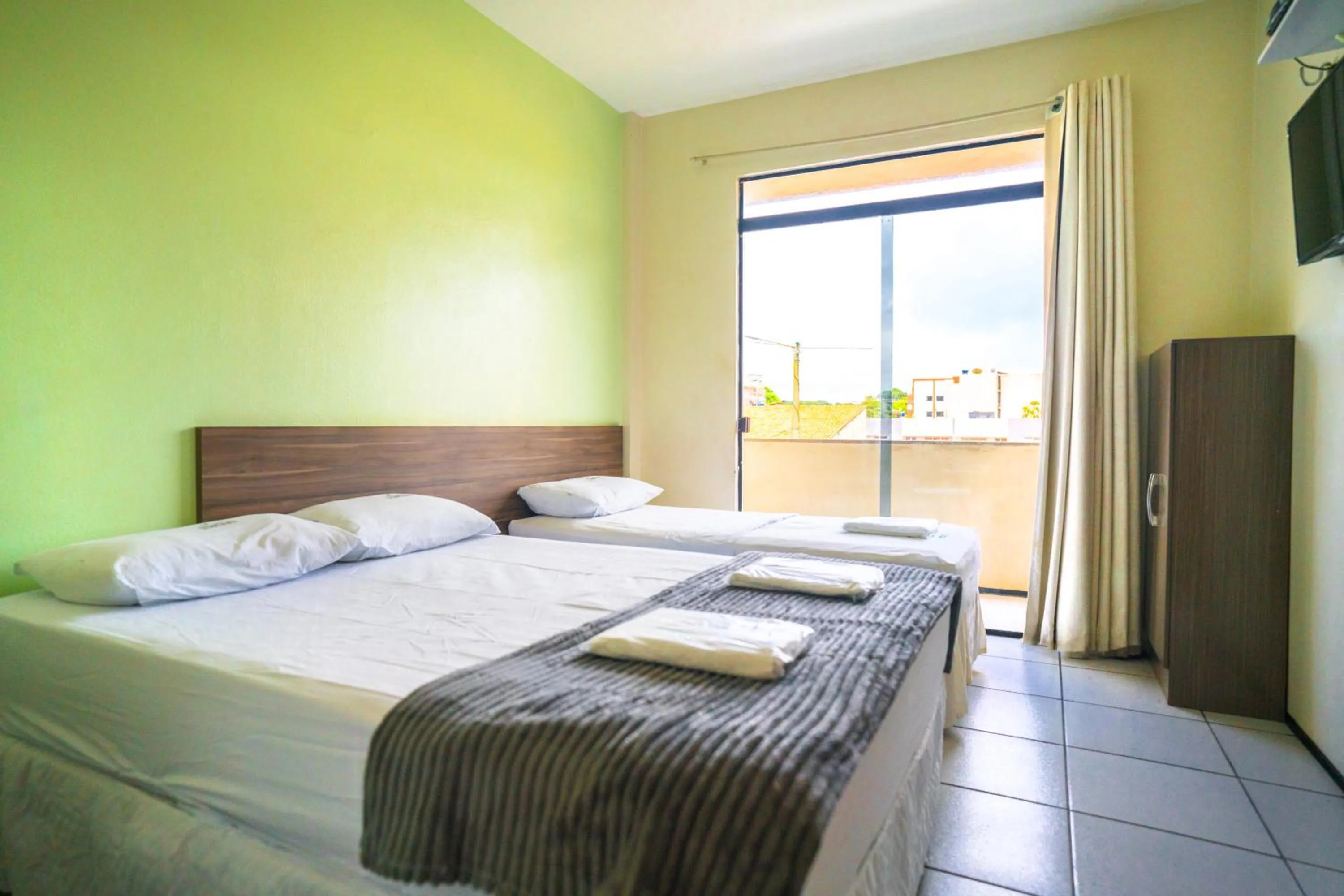 Bed in Hotel Pinheiro