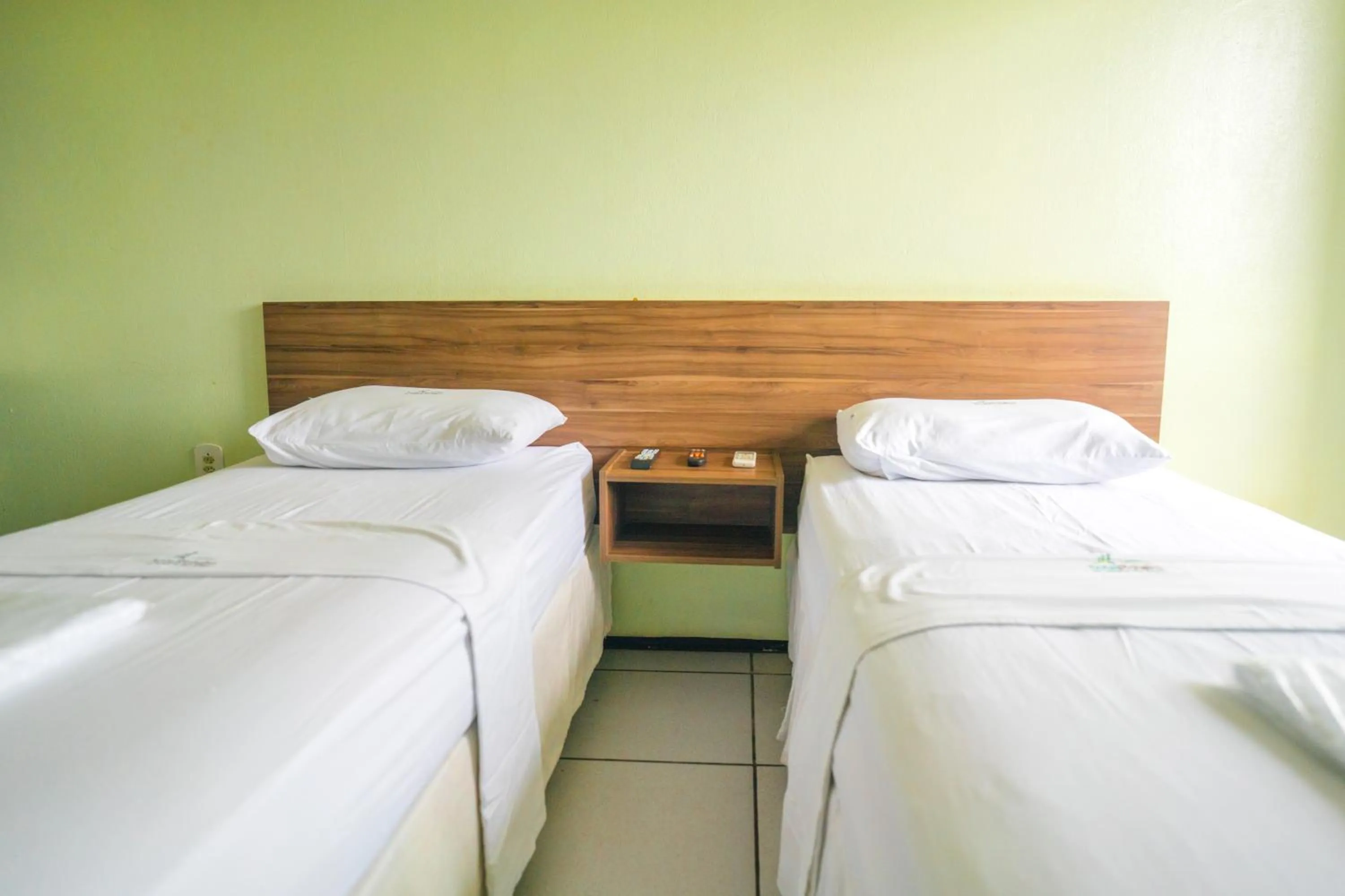 Bed in Hotel Pinheiro