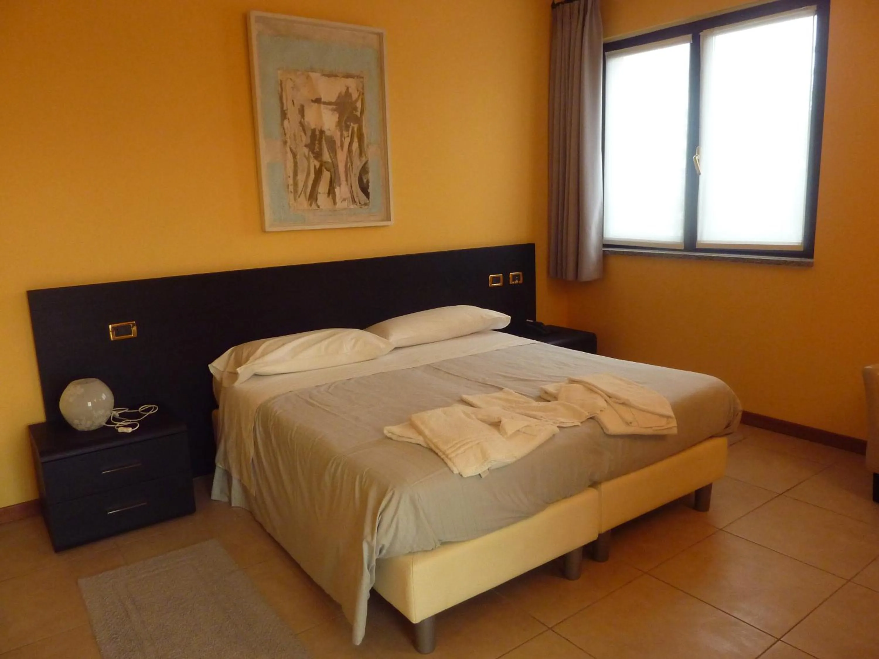 Bedroom, Bed in Hotel Padus Meublè Parma