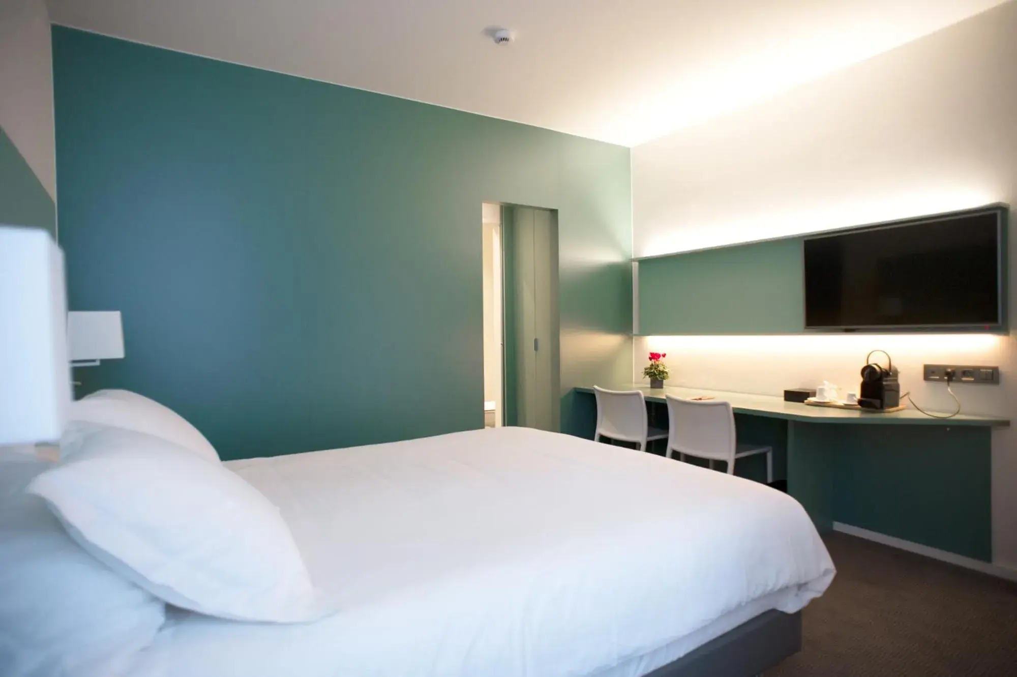 Photo of the whole room, Bed in Hotel Du Congres Photo of the whole room, Bed in Hotel Du Congres