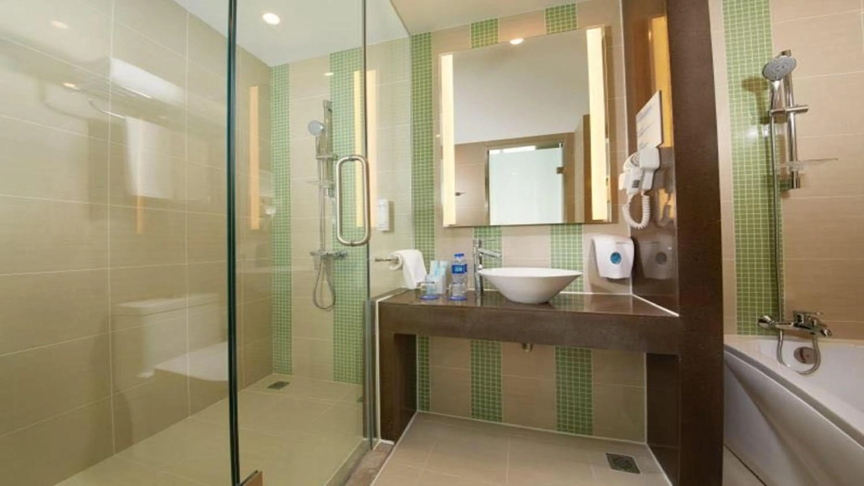 Bathroom in Holiday Inn Express Panjin Downtown by IHG
