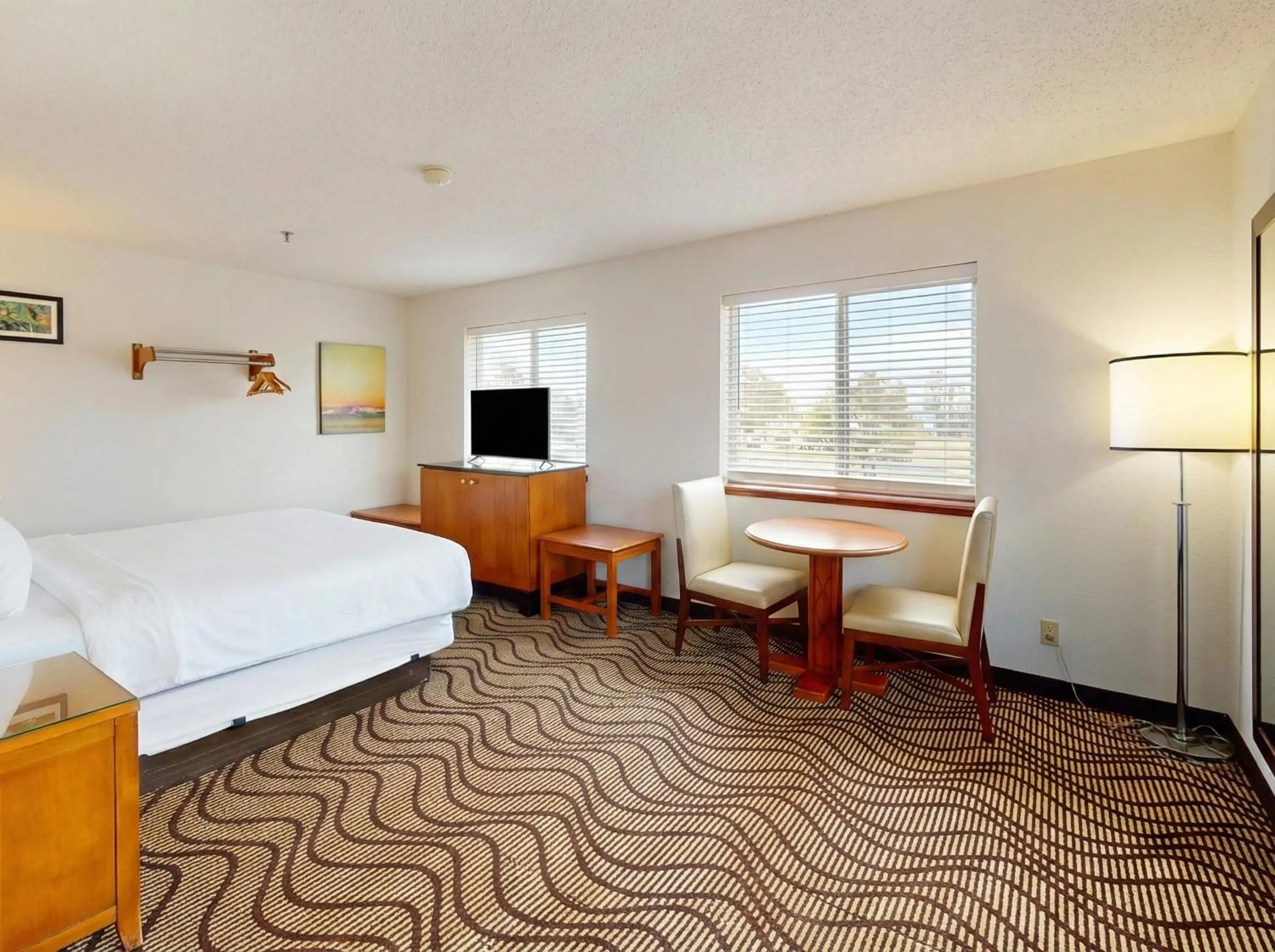 Bed in Oscoda Lakeside Hotel