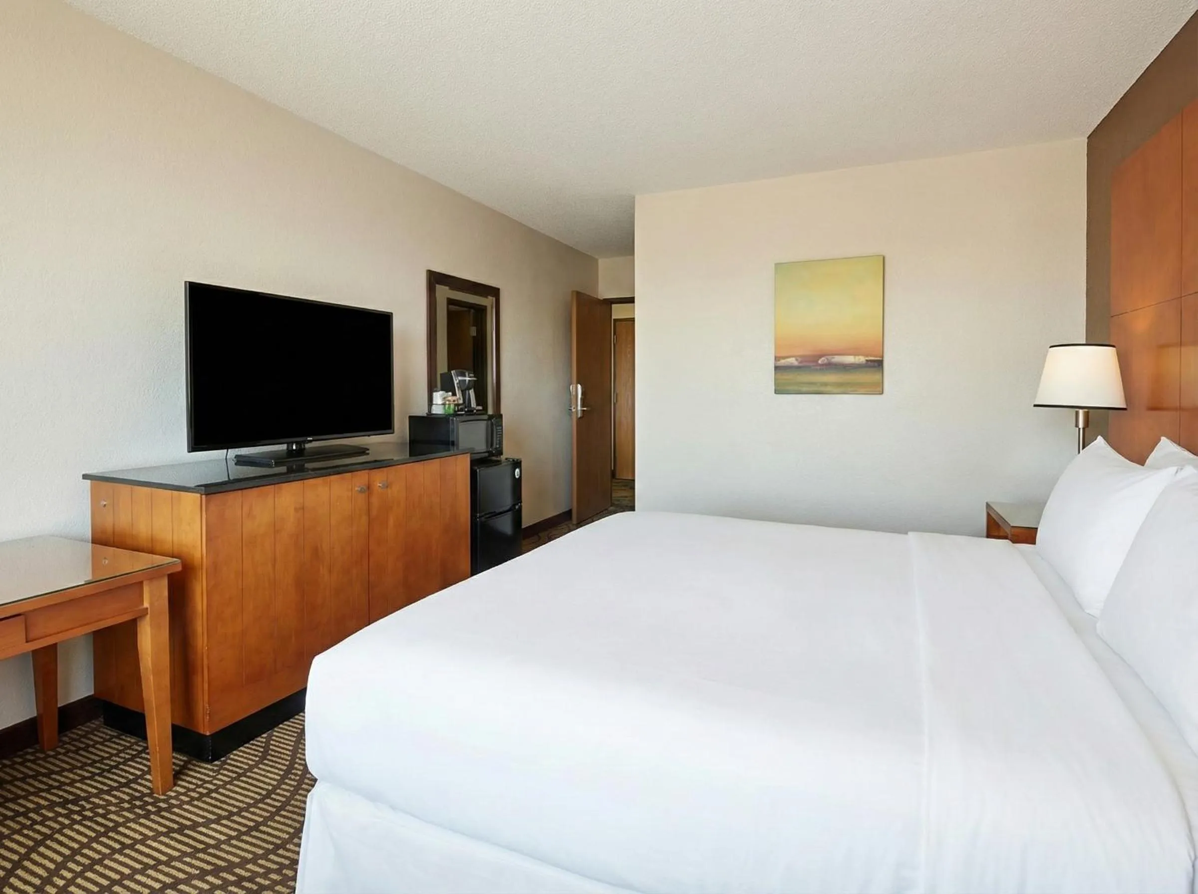 Bed in Oscoda Lakeside Hotel