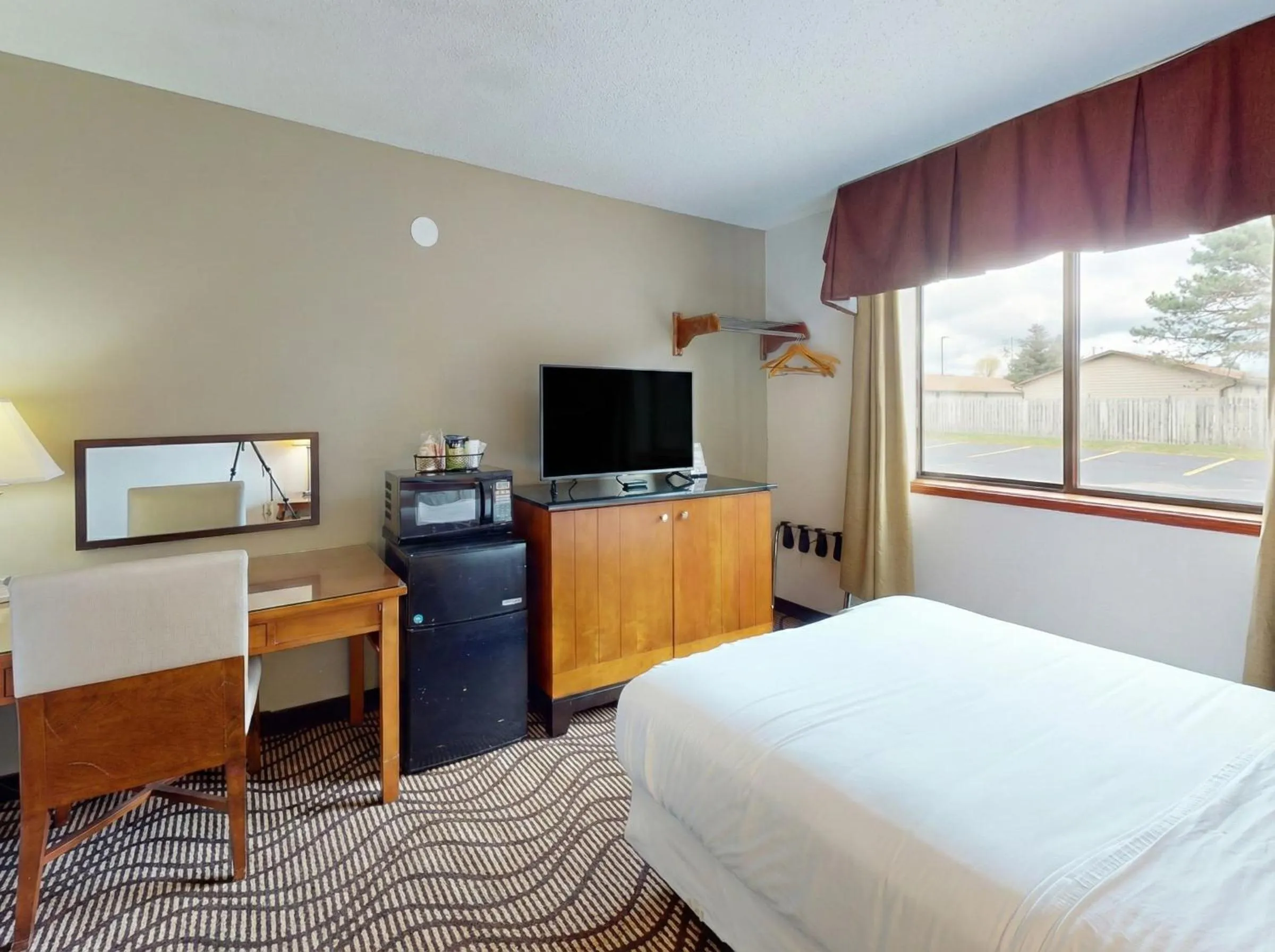 Photo of the whole room, Bed in Oscoda Lakeside Hotel