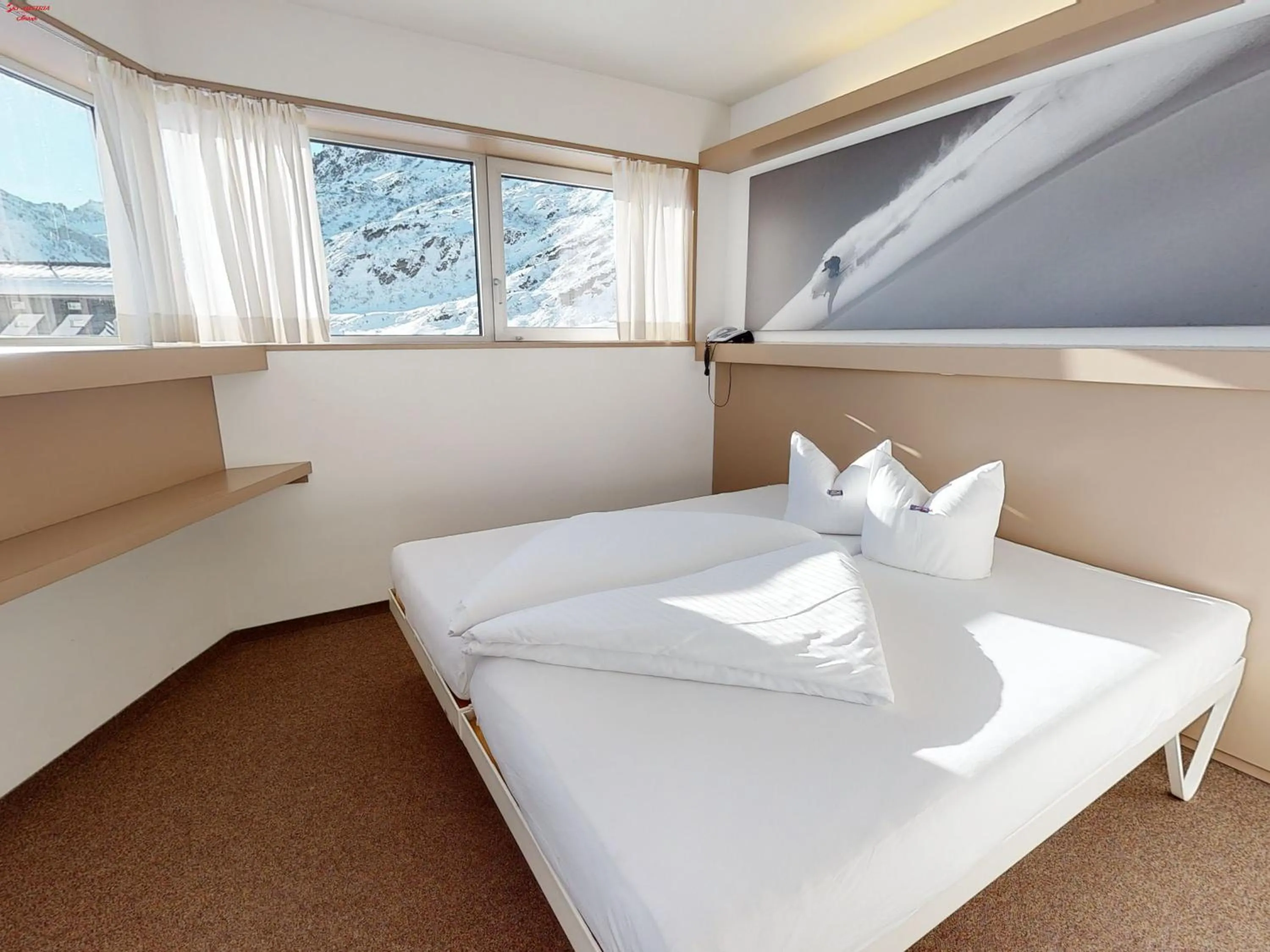 Photo of the whole room, Bed in Hotel Ski Austria St.Christoph a.A.