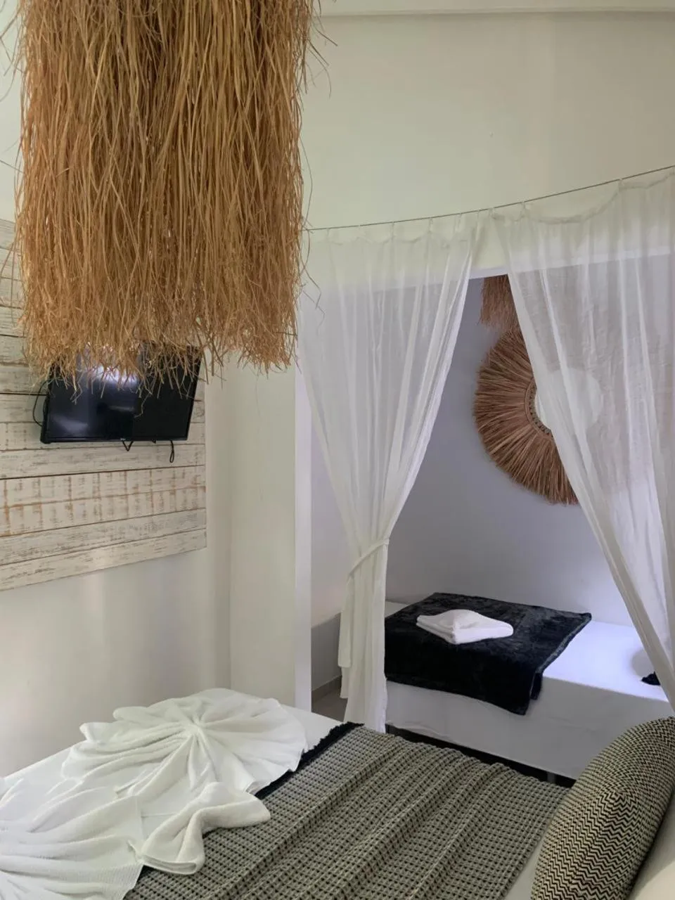 Bed in Pousada Agua de Coco