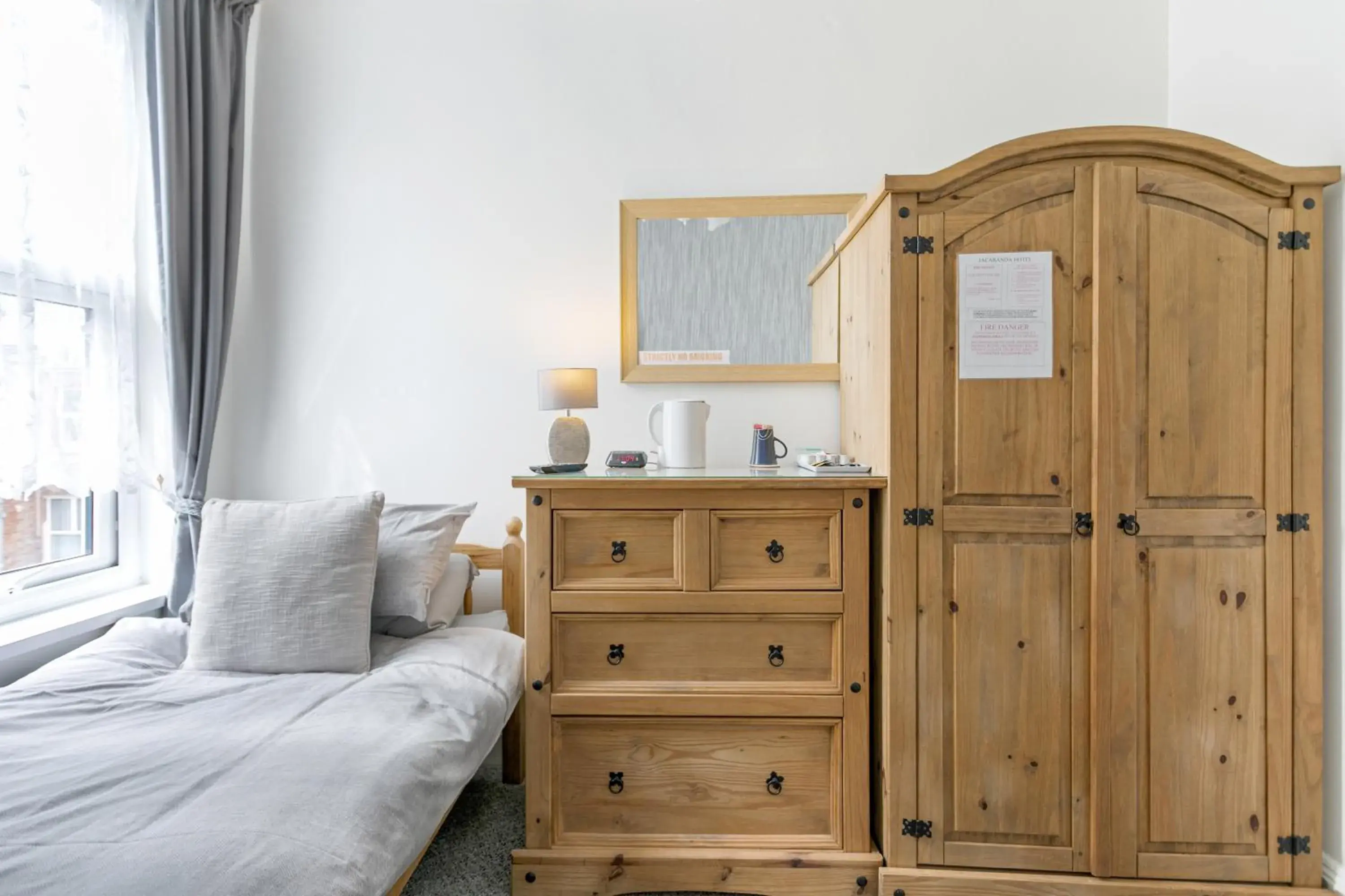 Bedroom, Bed in Jacaranda Hotel Bedroom, Bed in Jacaranda Hotel