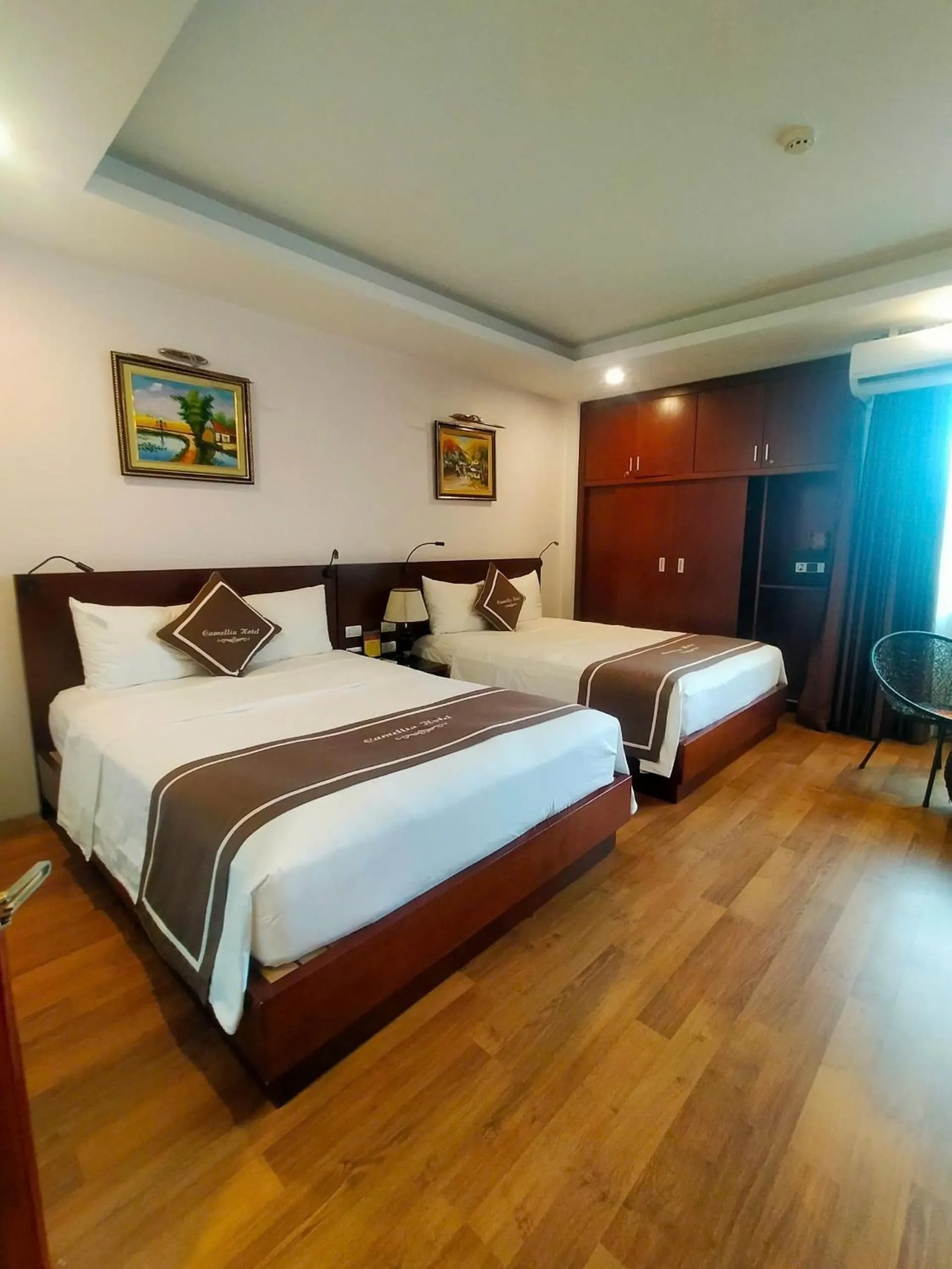 Photo of the whole room, Bed in Camellia Hotel