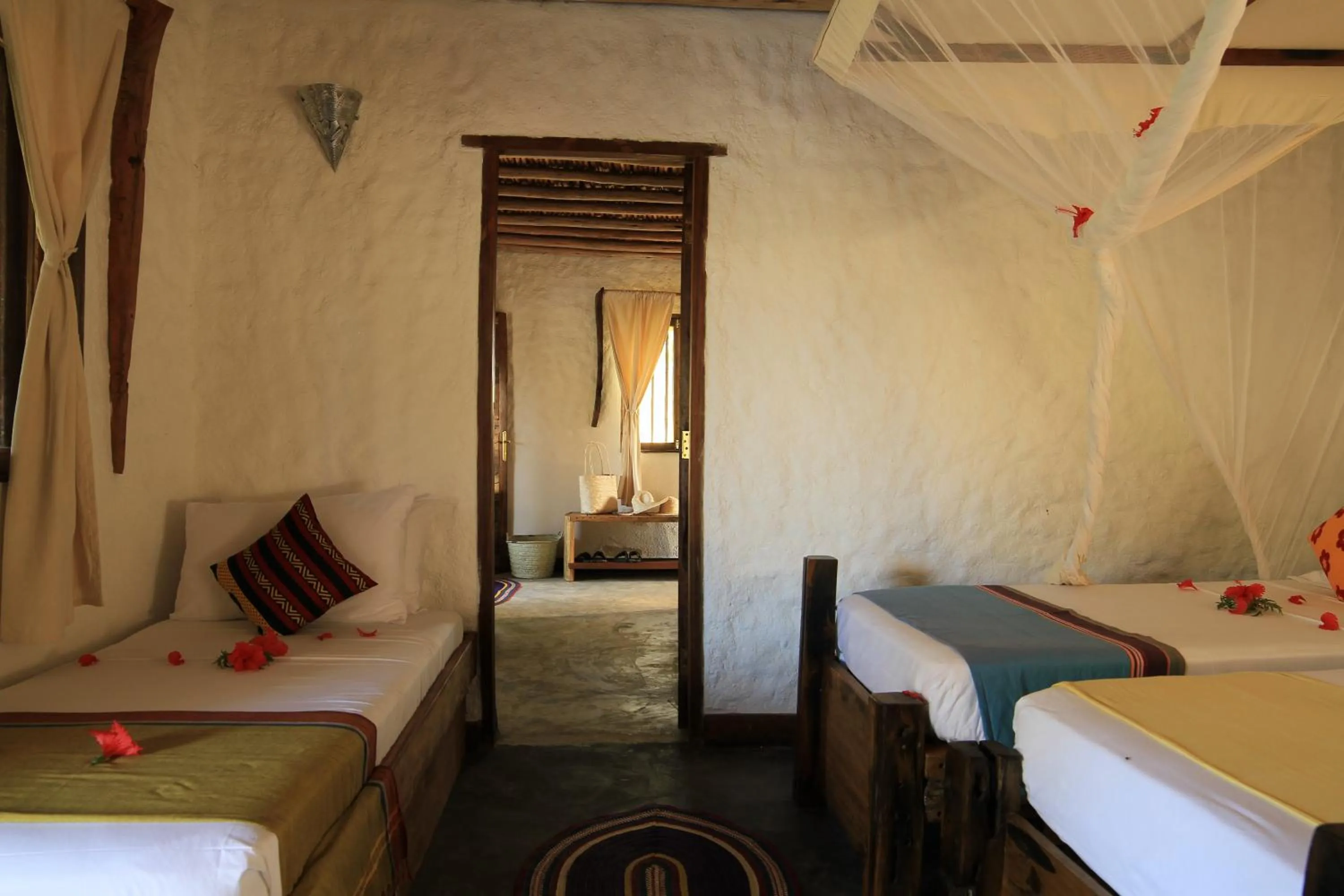 Photo of the whole room, Bed in Ujamaa Beach Resort