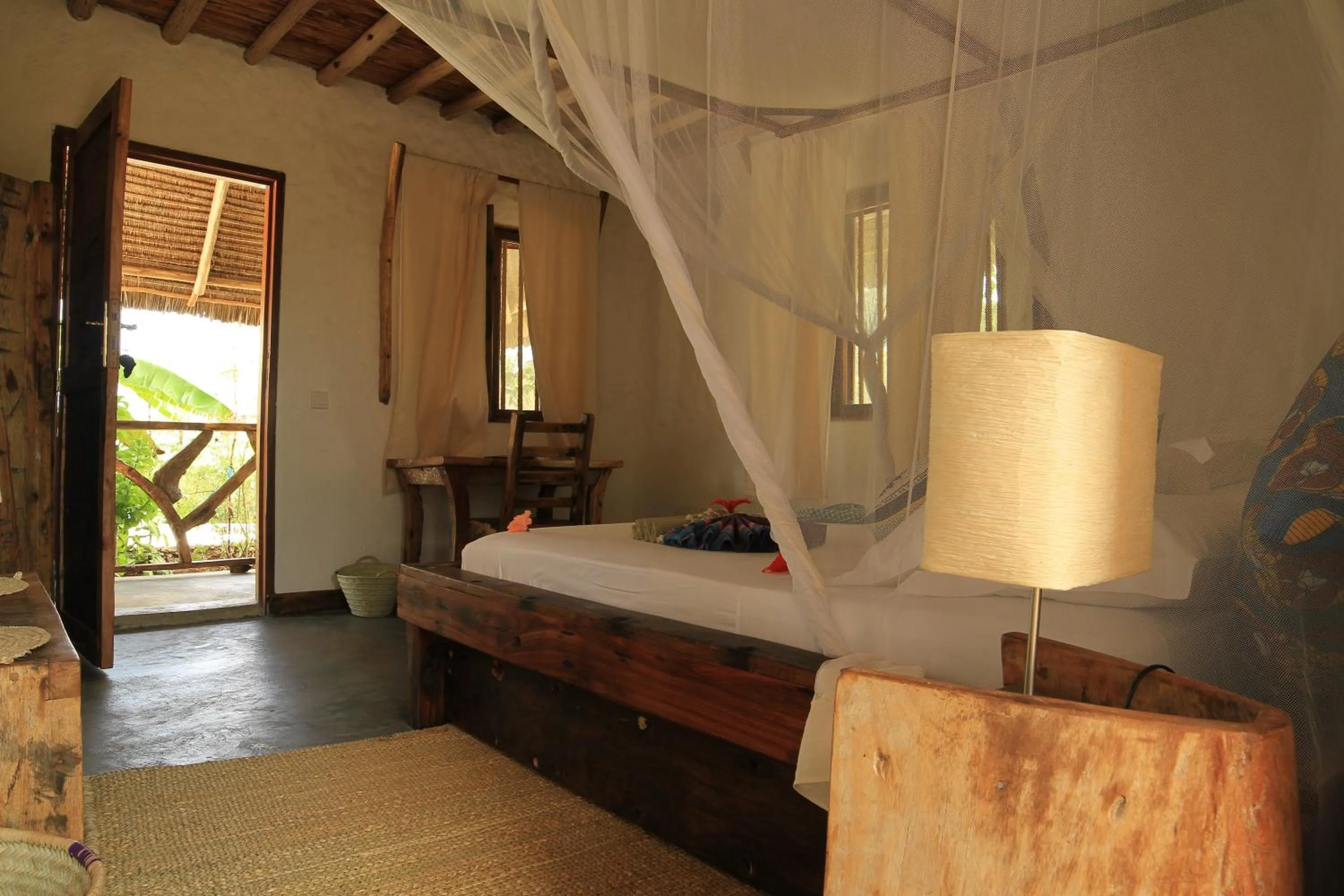 Photo of the whole room, Bed in Ujamaa Beach Resort