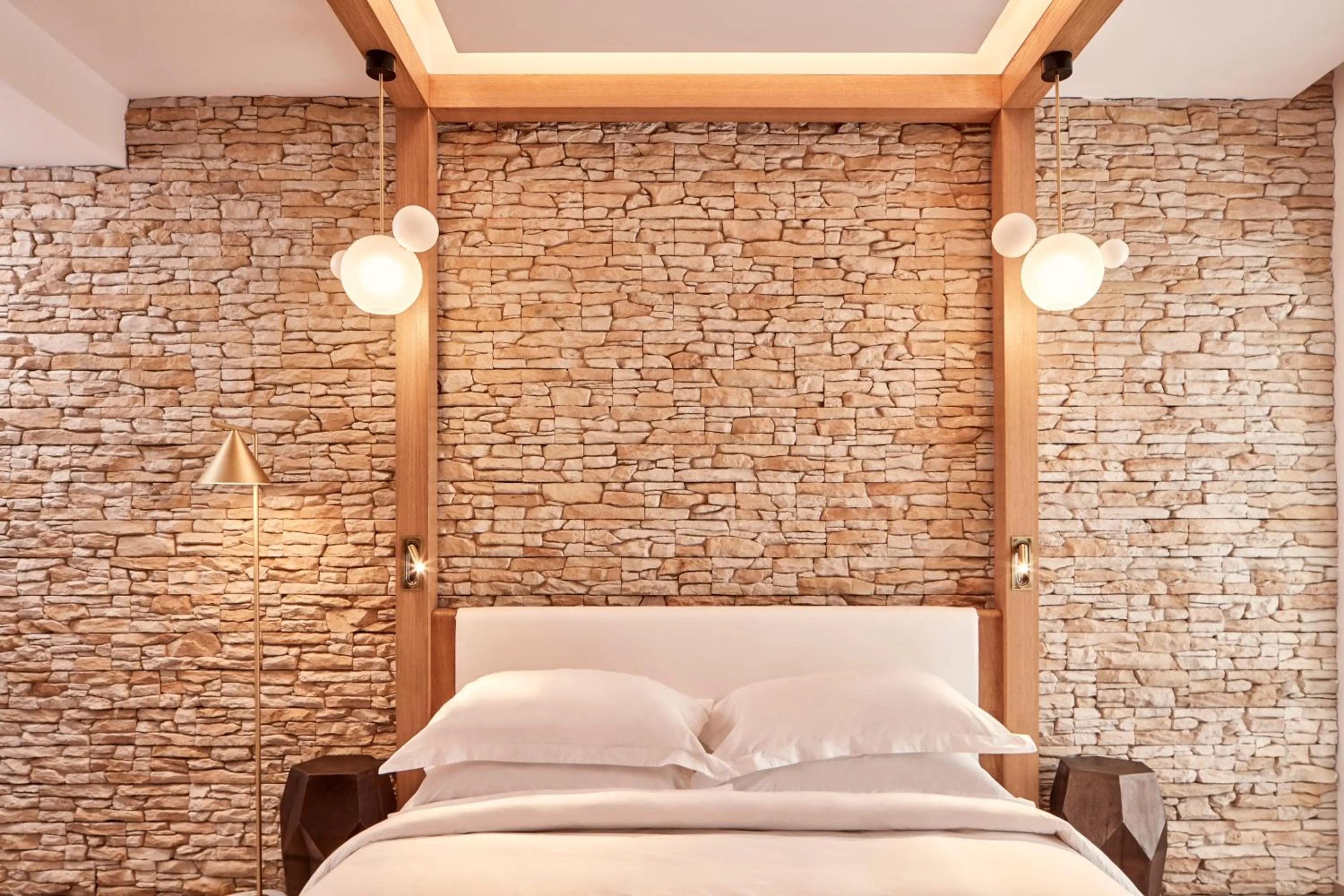 Bed in Myconian Naia - Preferred Hotels & Resorts