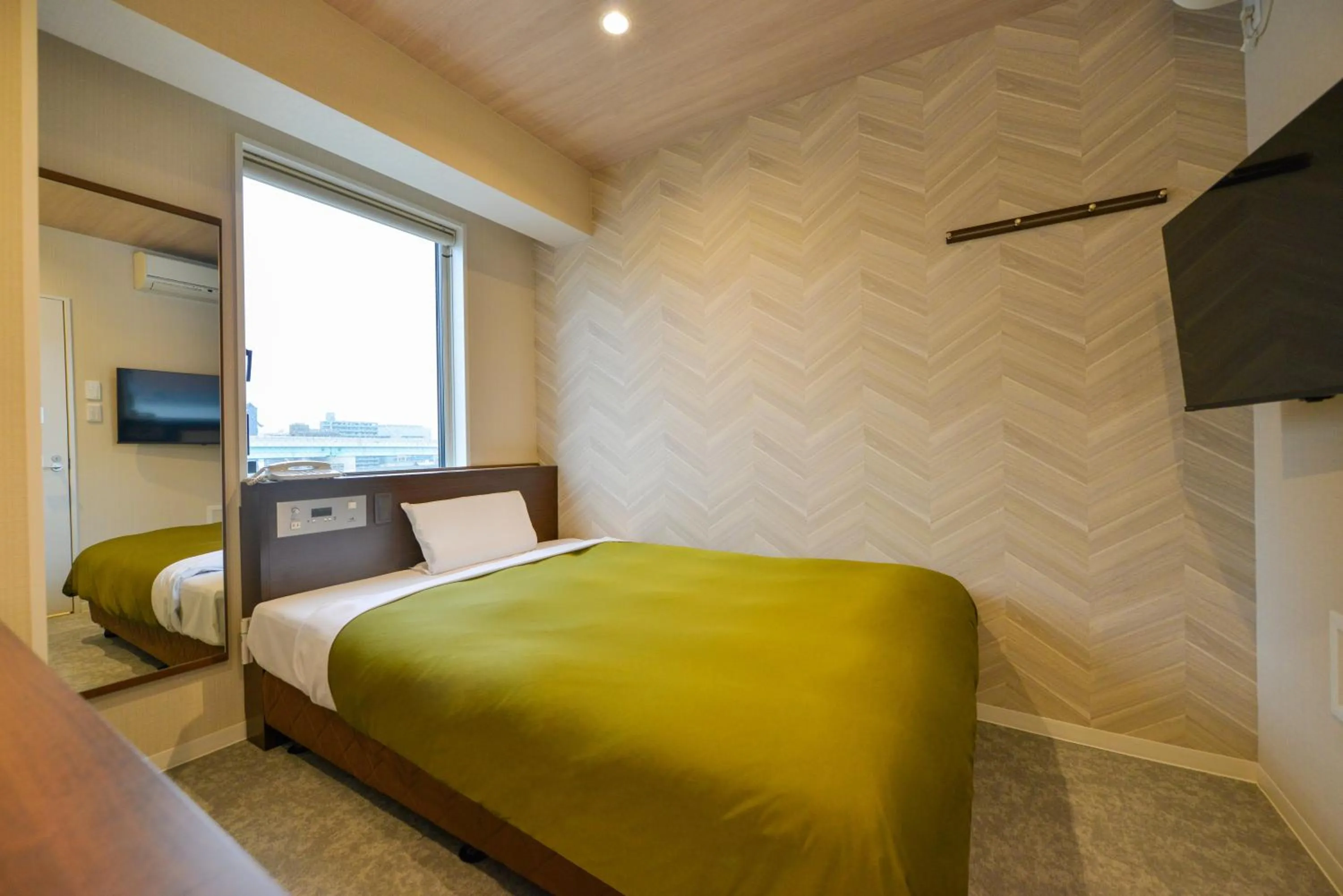 Photo of the whole room, Bed in Hotel New Gaea Kamigofuku