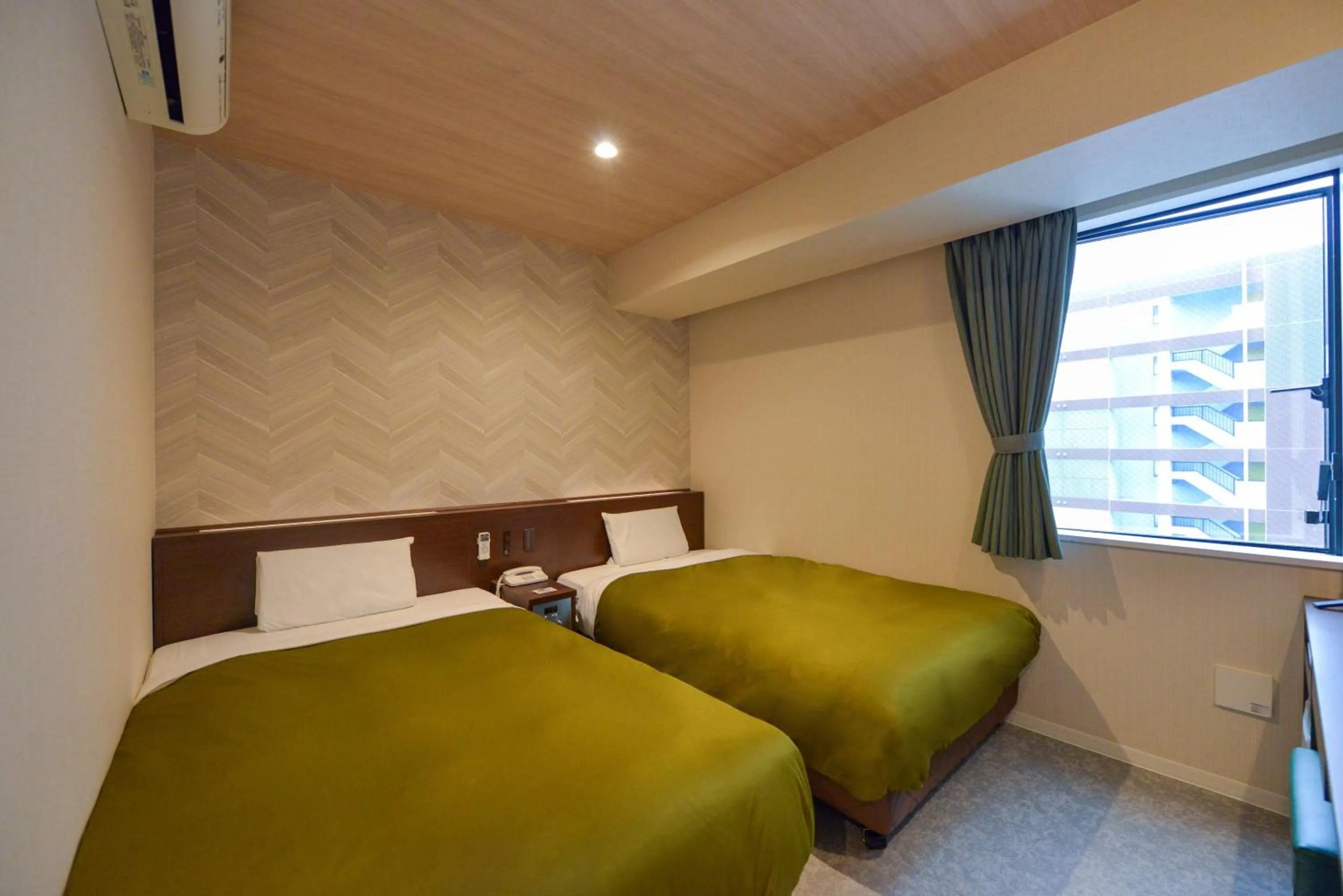 Photo of the whole room, Bed in Hotel New Gaea Kamigofuku