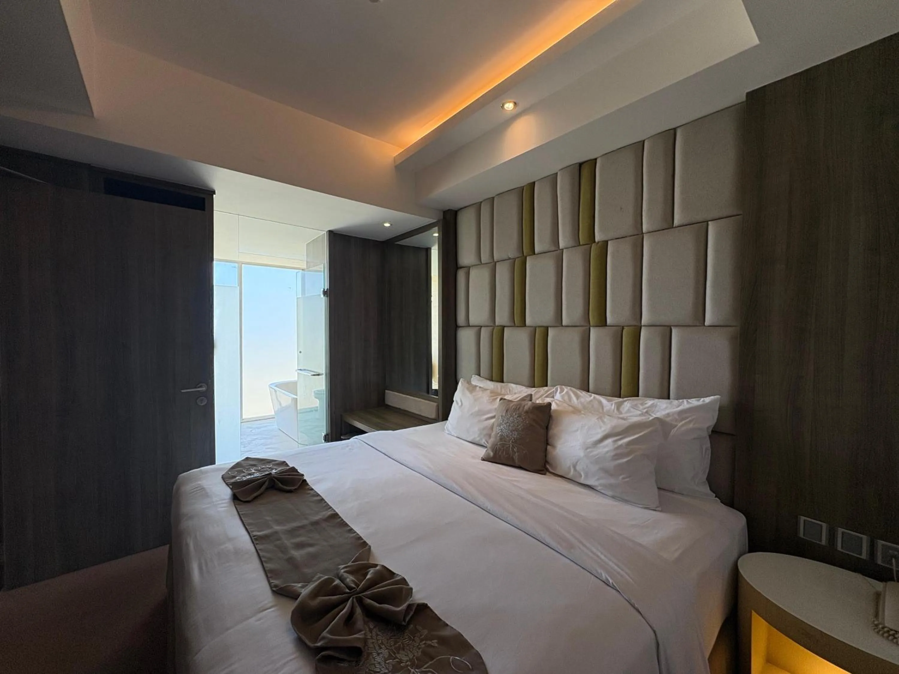 Bed in The Crystal Luxury Bay Resort Nusa Dua