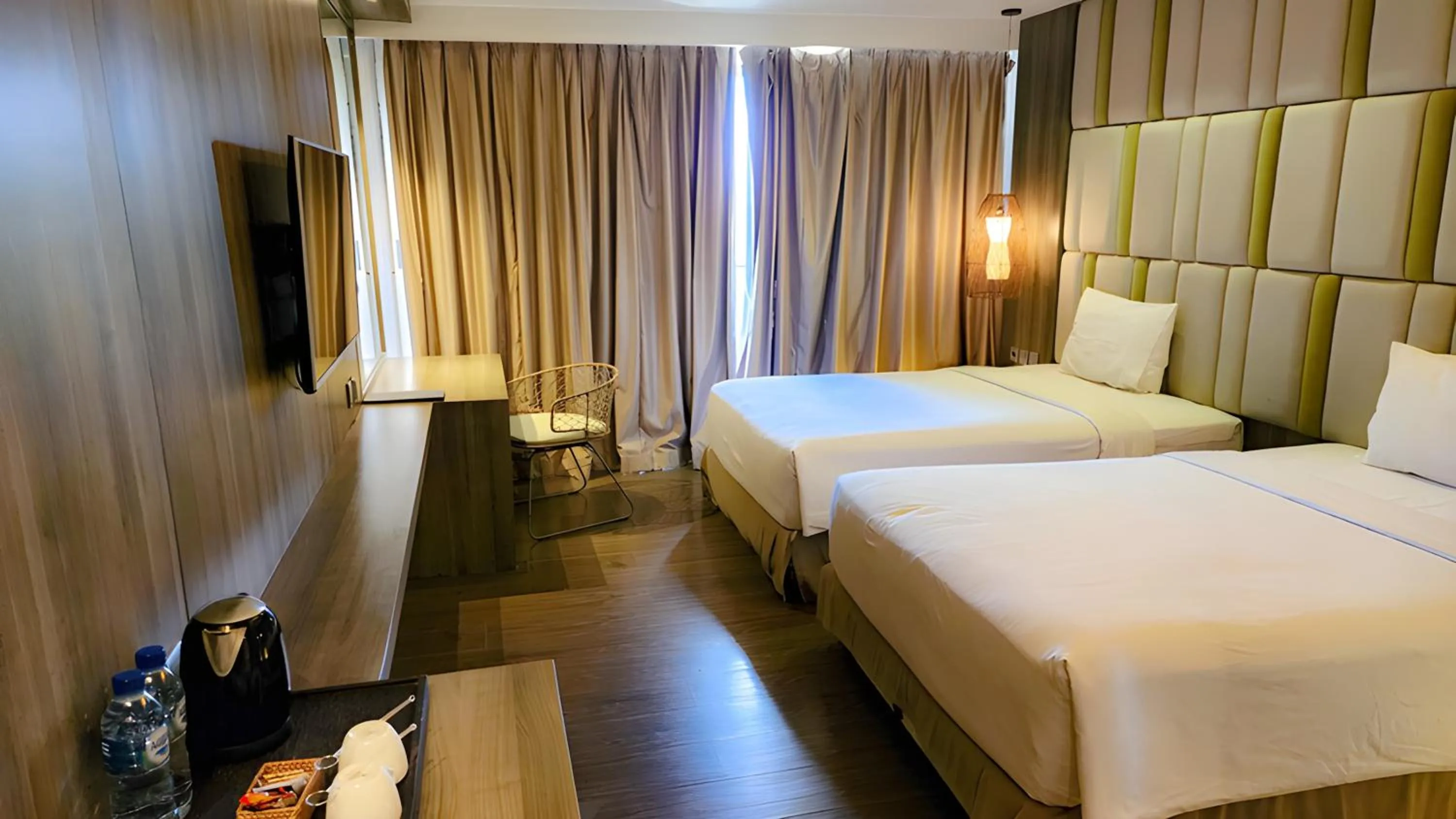 Bed in The Crystal Luxury Bay Resort Nusa Dua