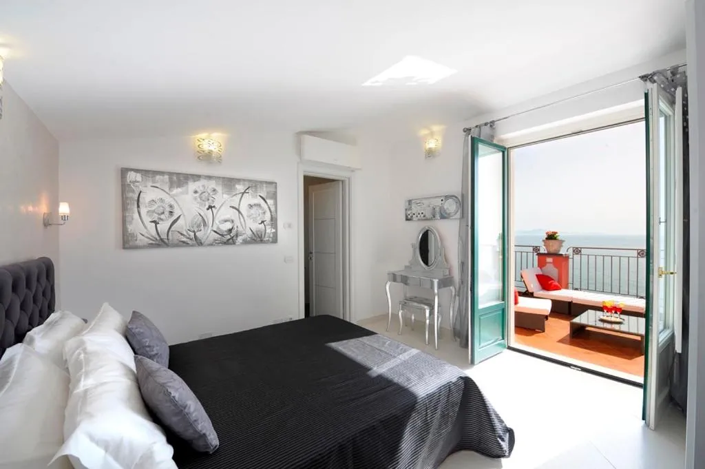 Bed in Palazzo Rocco Villa Sunshining in Love