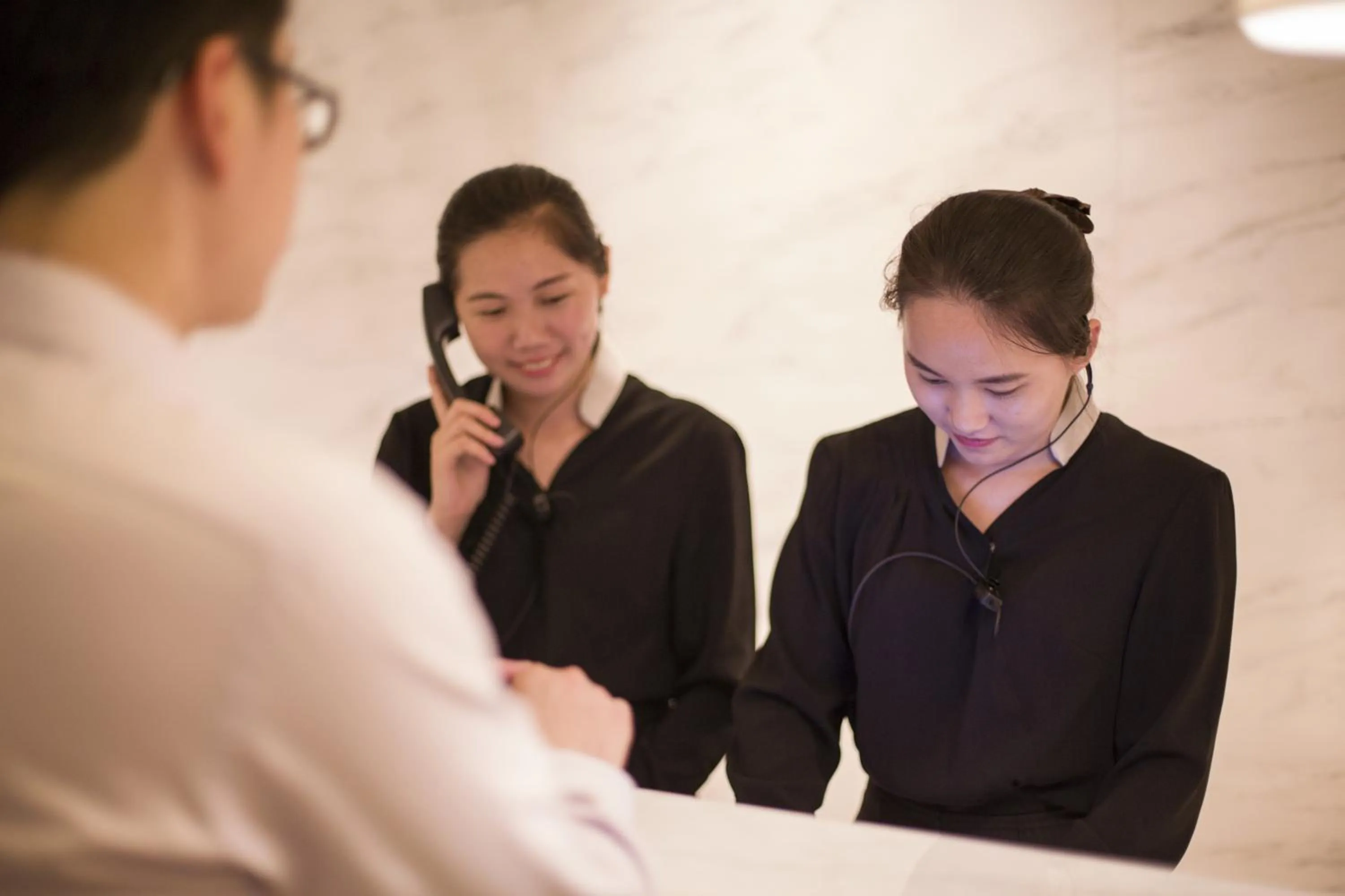 Staff in Crystal Orange Hotel Guangzhou Taojin Branch