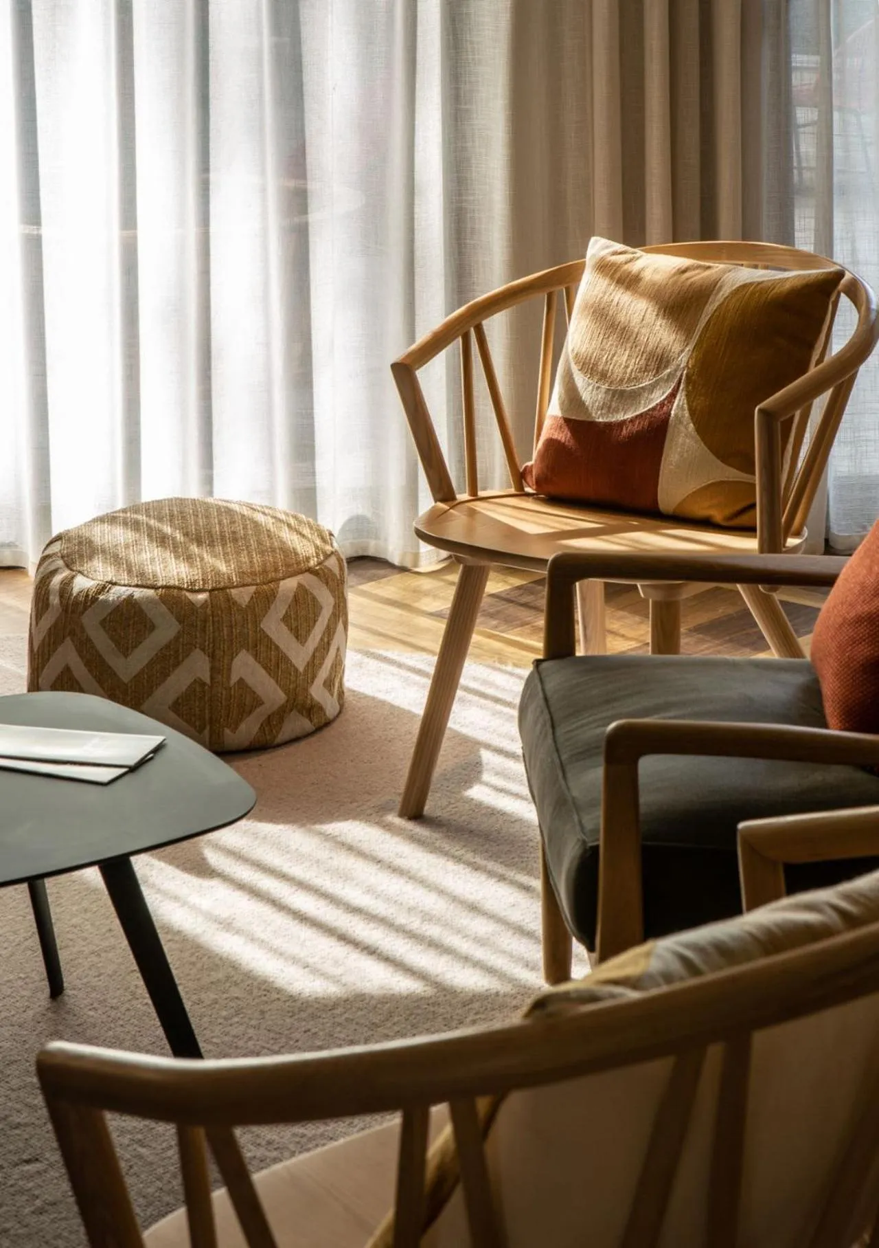 Communal lounge/ TV room in Hôtel Antares & Spa