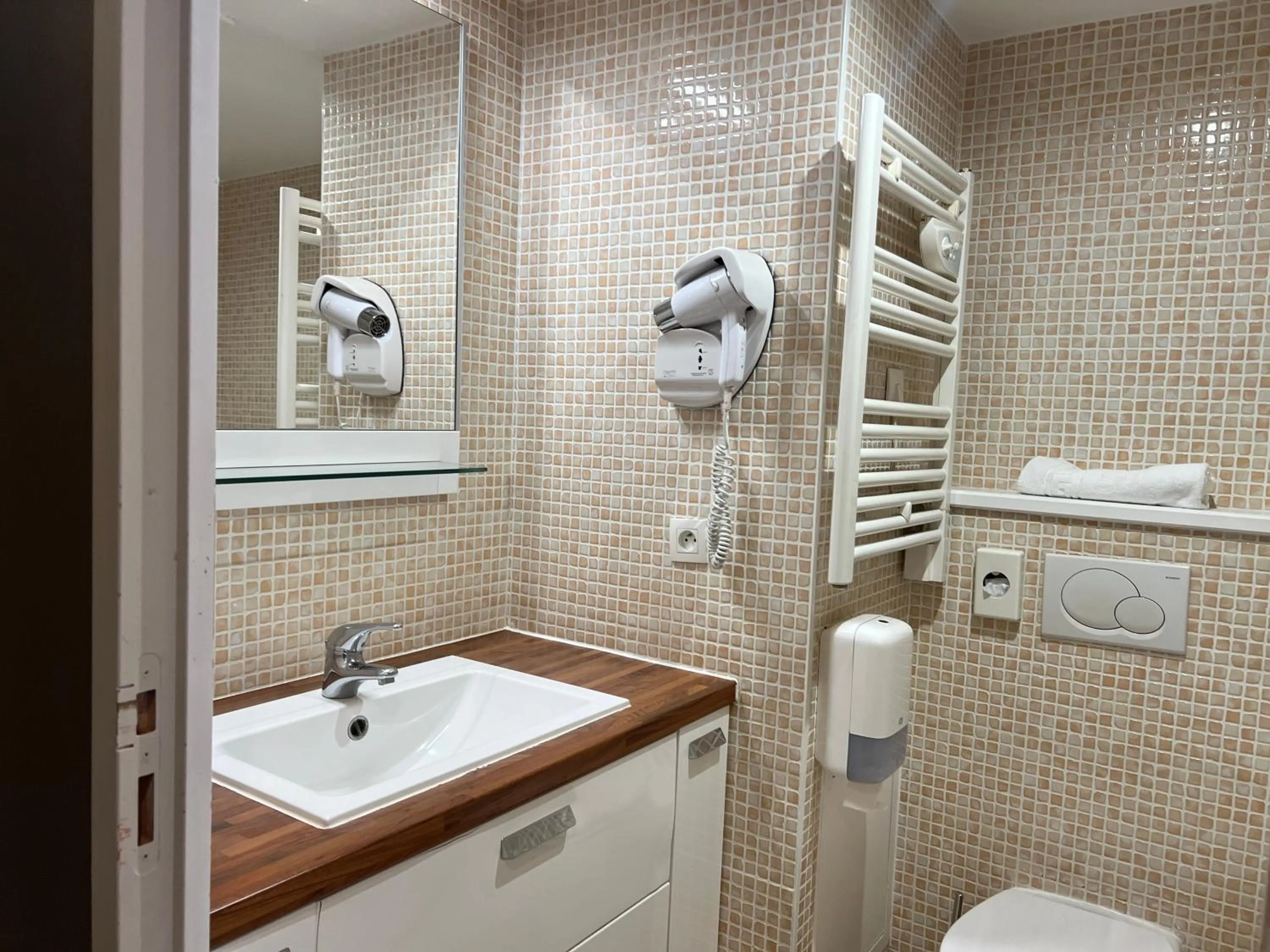 Bathroom in Le Trophée Boutique Hôtel Spa- La Loggia Appart'hôtel