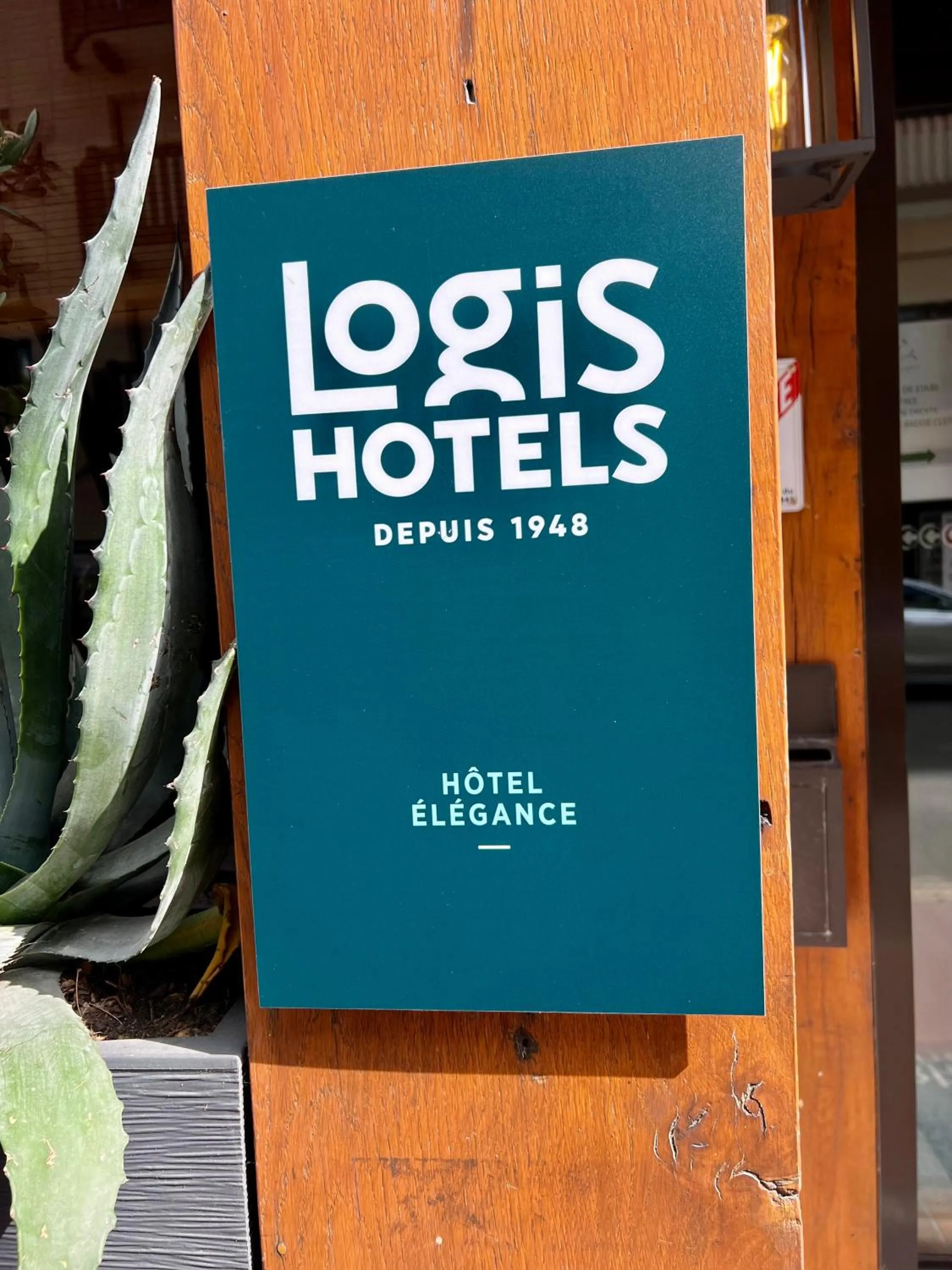 Property logo or sign in Le Trophée Boutique Hôtel Spa- La Loggia Appart'hôtel