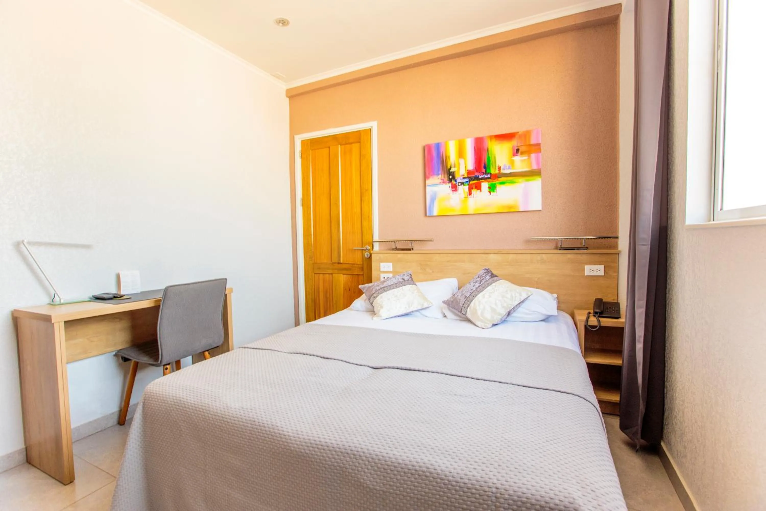 Photo of the whole room, Bed in Q-Inn Boutique Hotel