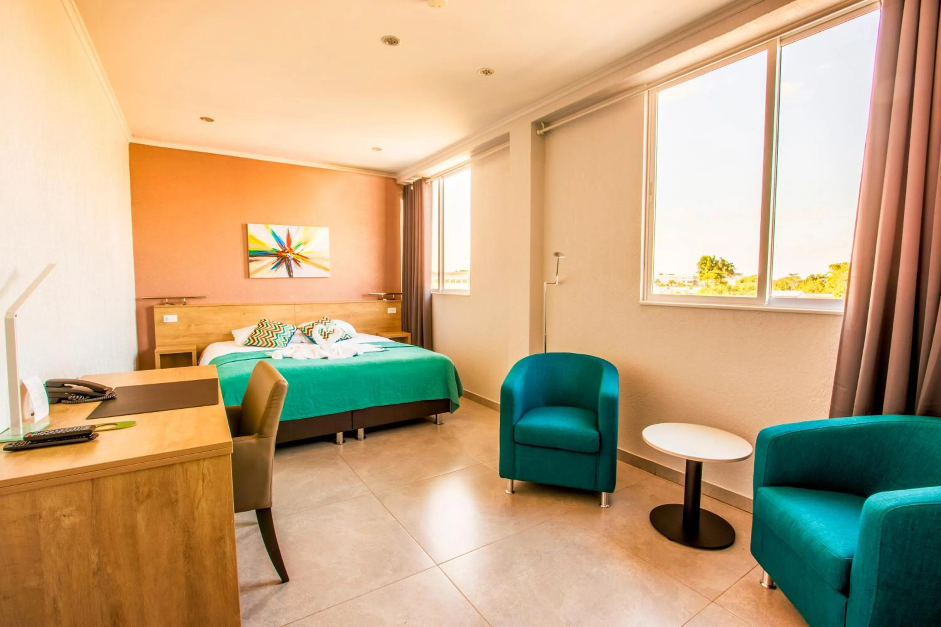 Bed in Q-Inn Boutique Hotel