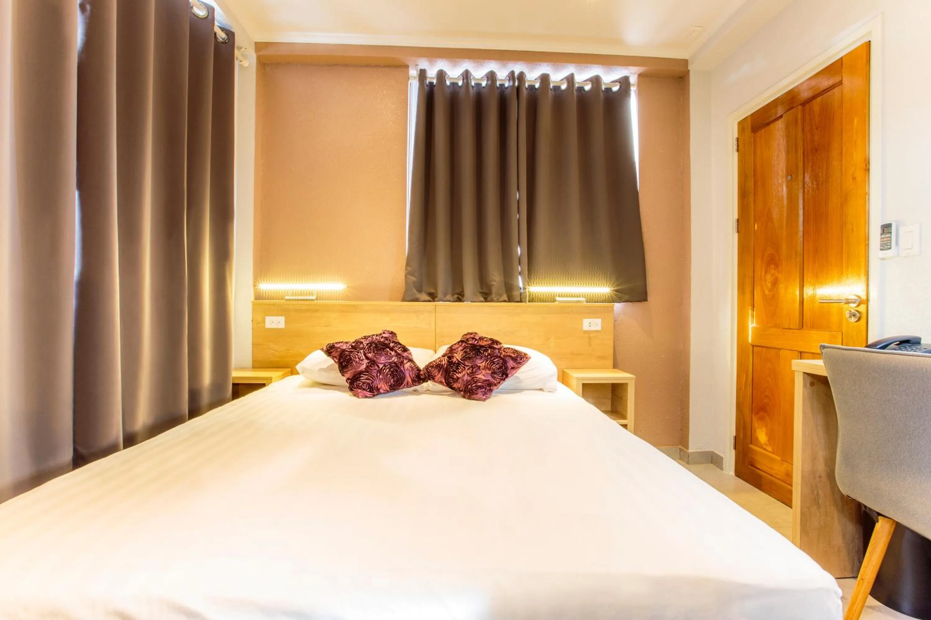 Photo of the whole room, Bed in Q-Inn Boutique Hotel