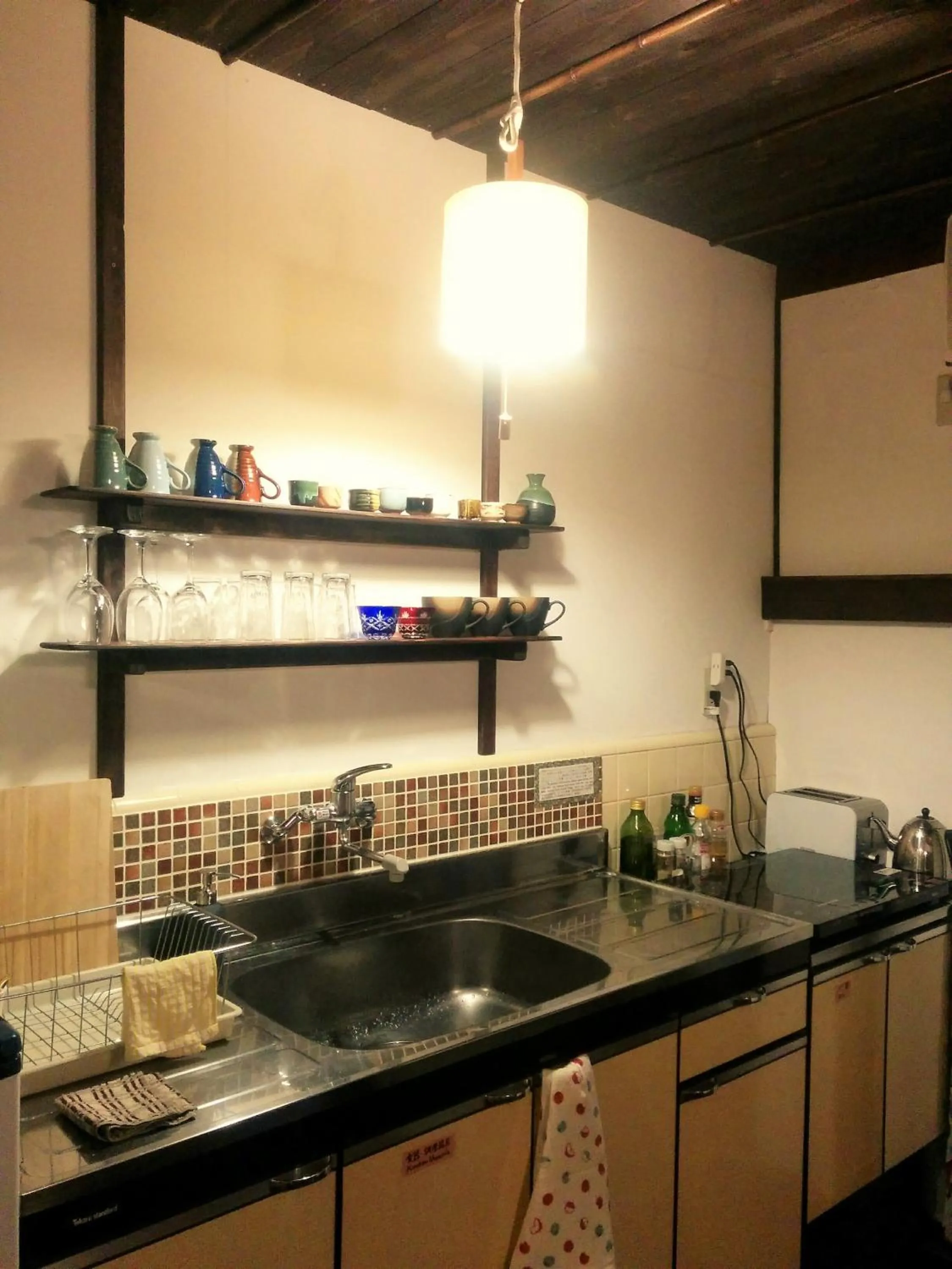 Kitchen or kitchenette in Murasakino Guesthouse
