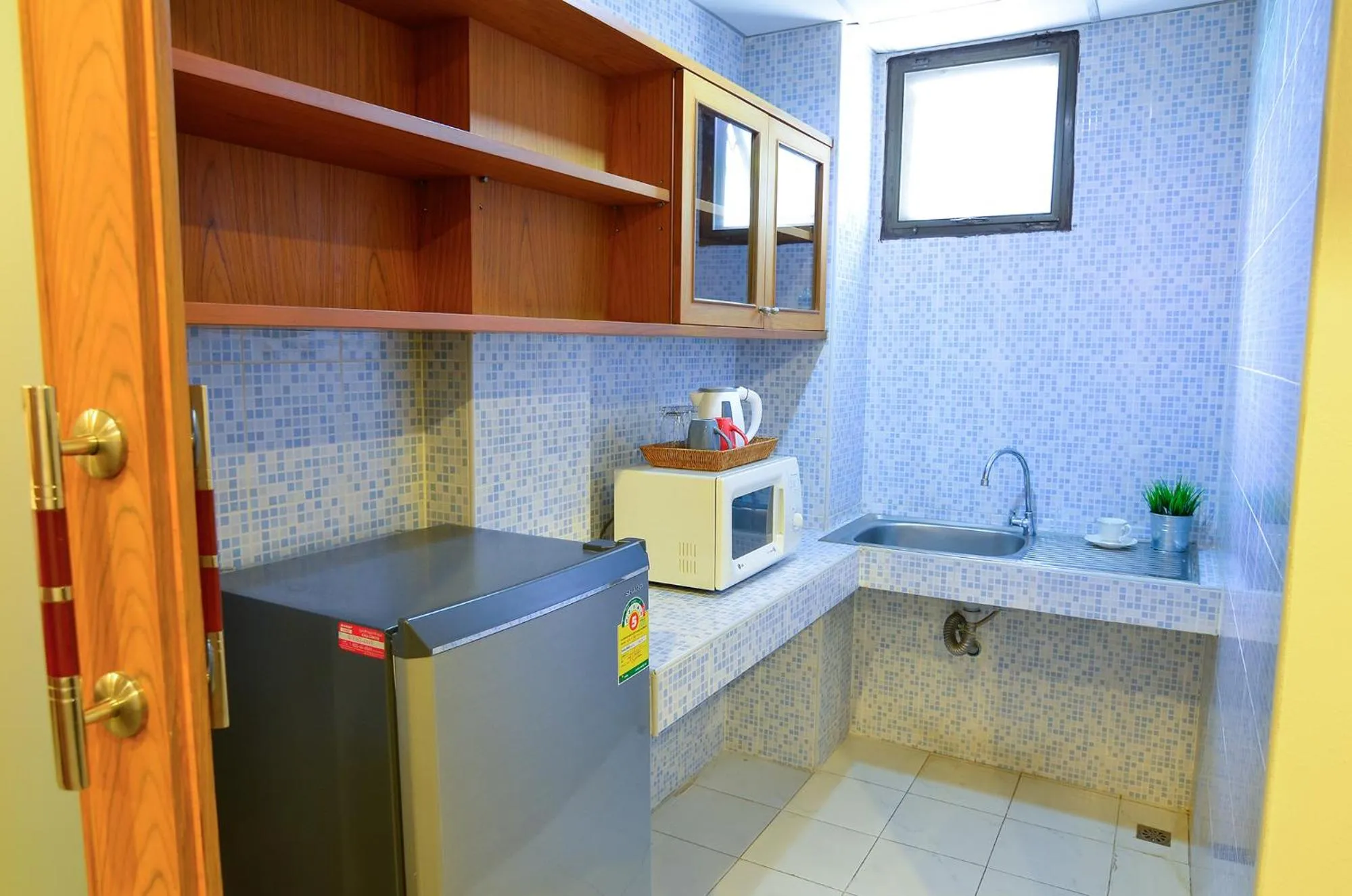 Kitchen or kitchenette in BJ Boutique