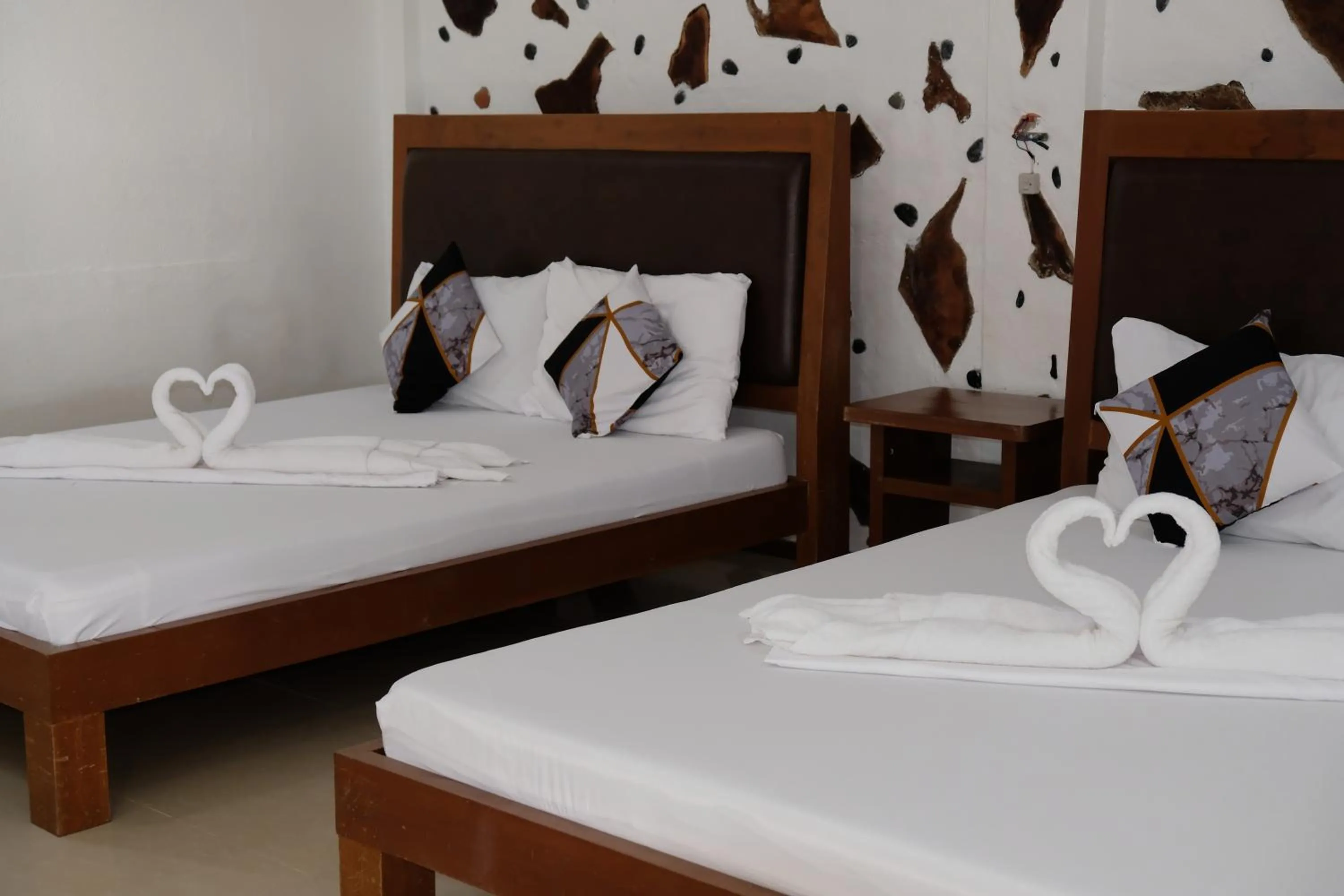 Bedroom, Bed in Sundown Resort & Austrian Pension House