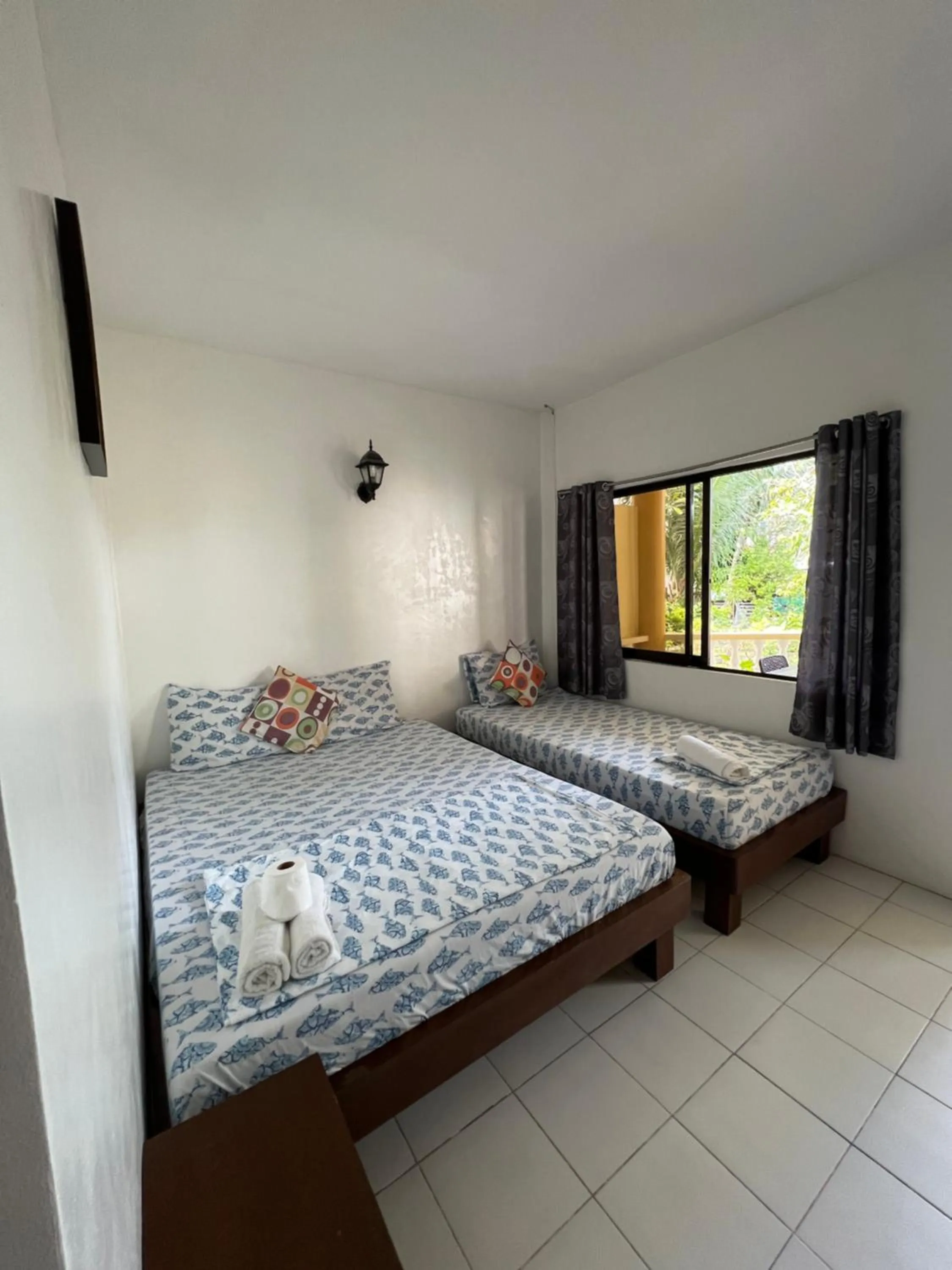 Bed in Sundown Resort & Austrian Pension House