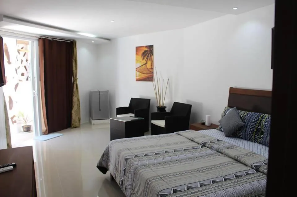 Bed in Sundown Resort & Austrian Pension House