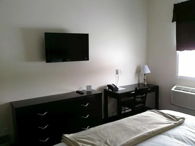 TV and multimedia, Bed in Auberge MacDonald Guest Inn