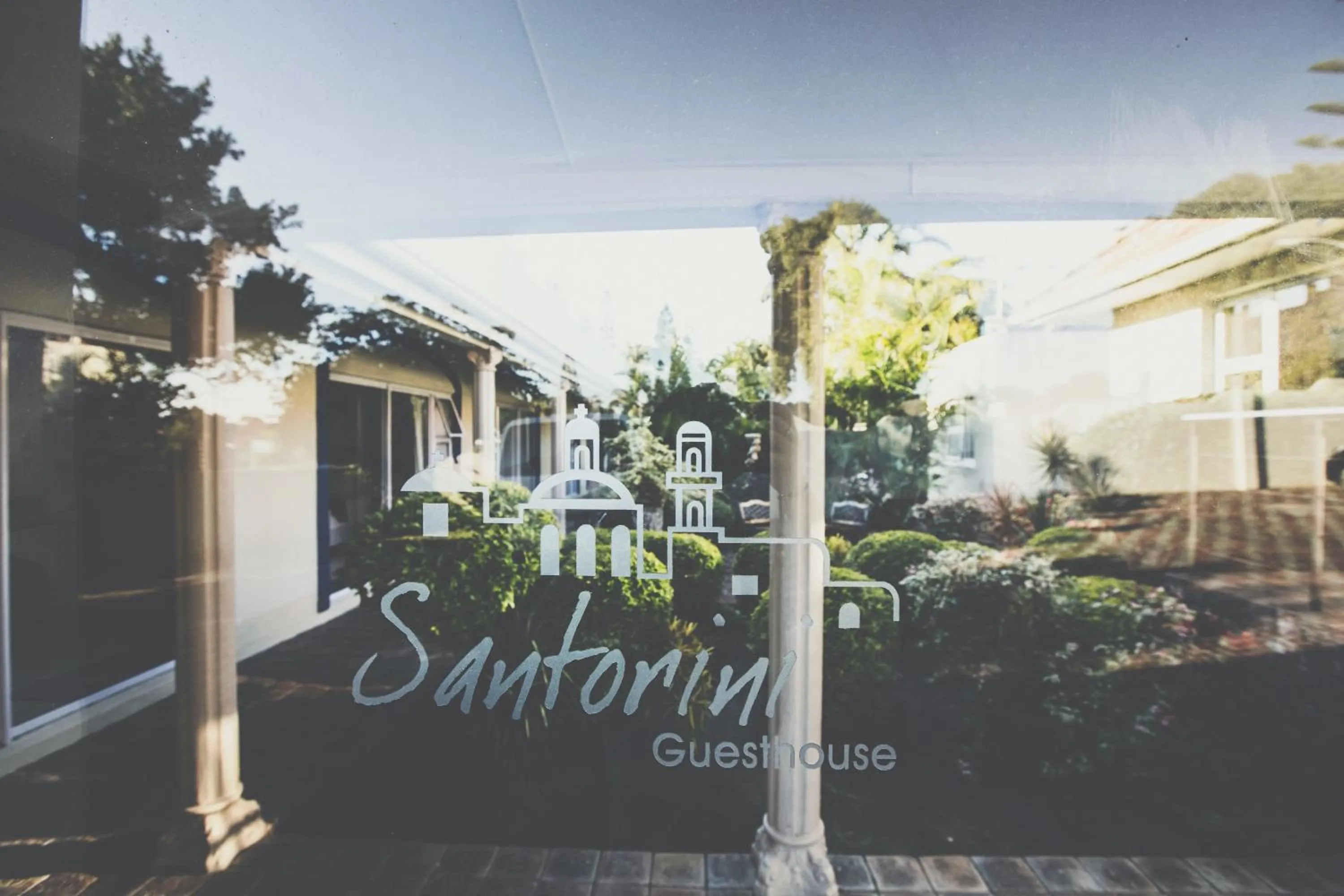 Property logo or sign in Santorini Guesthouse